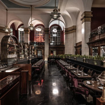 Luxurious interior of The Lucky Cat restaurant, showcasing Art Deco design and Japanese-inspired decor in Tokyo.
