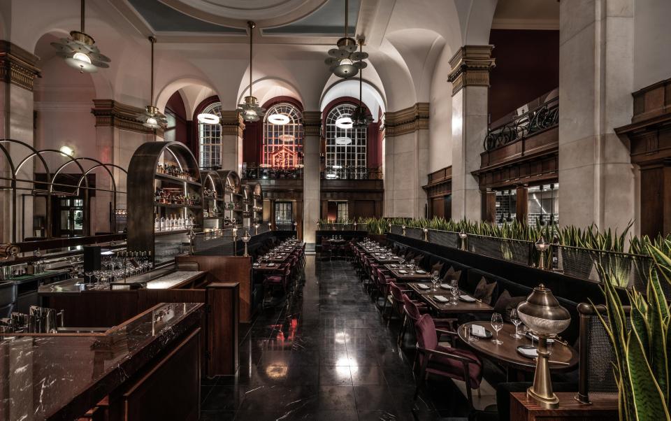 Luxurious interior of The Lucky Cat restaurant, showcasing Art Deco design and Japanese-inspired decor in Tokyo.