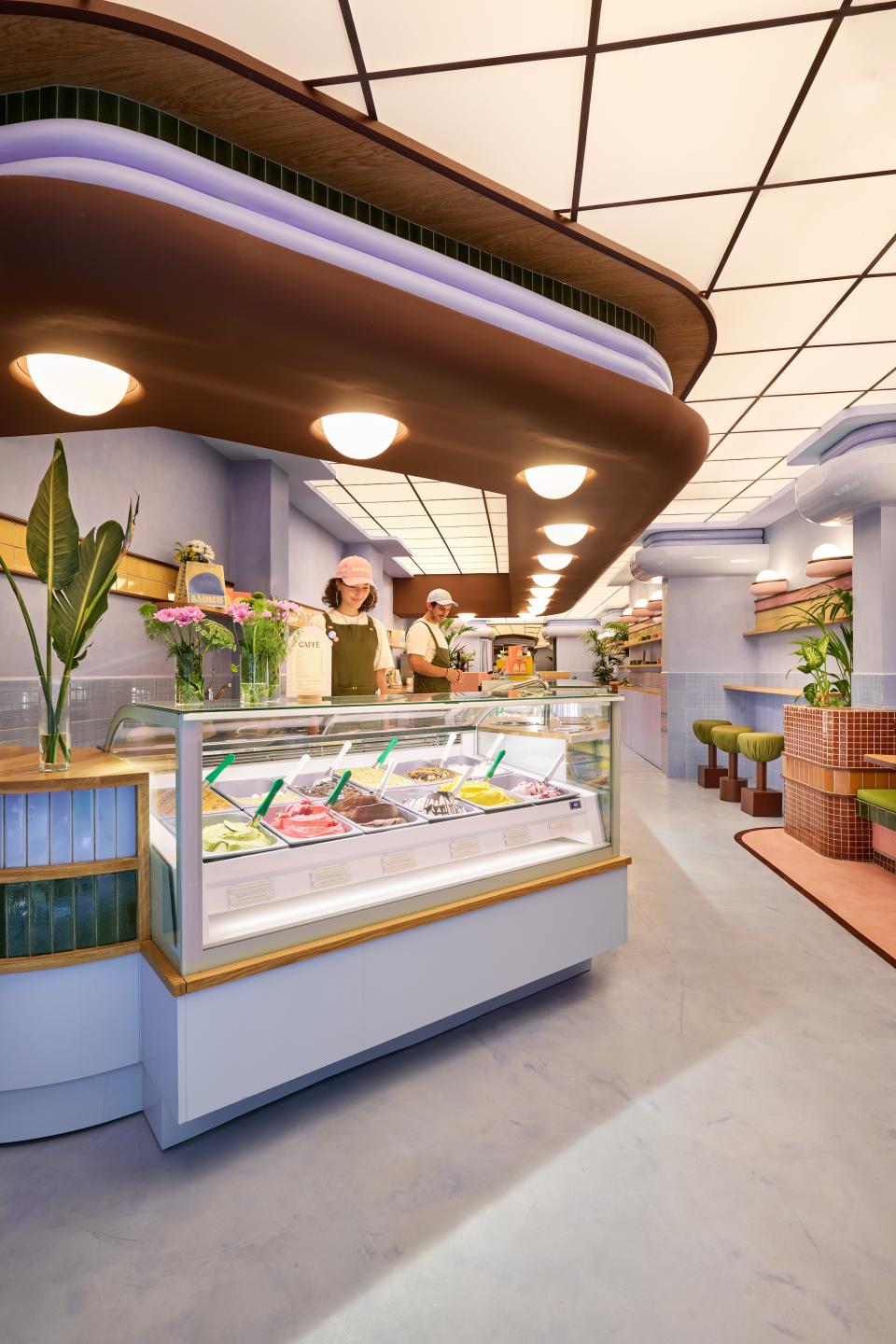 Brightly colored ice cream display in a stylish Art Deco-inspired Barcelona parlour featuring unique design elements and vibrant decor.