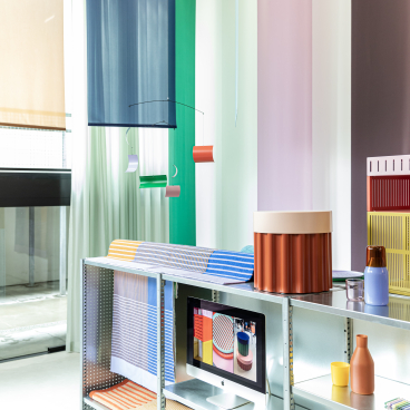 Vibrant display of Dutch design featuring colorful textiles, modern decor, and innovative crafts at Dutch Design Week 2024.
