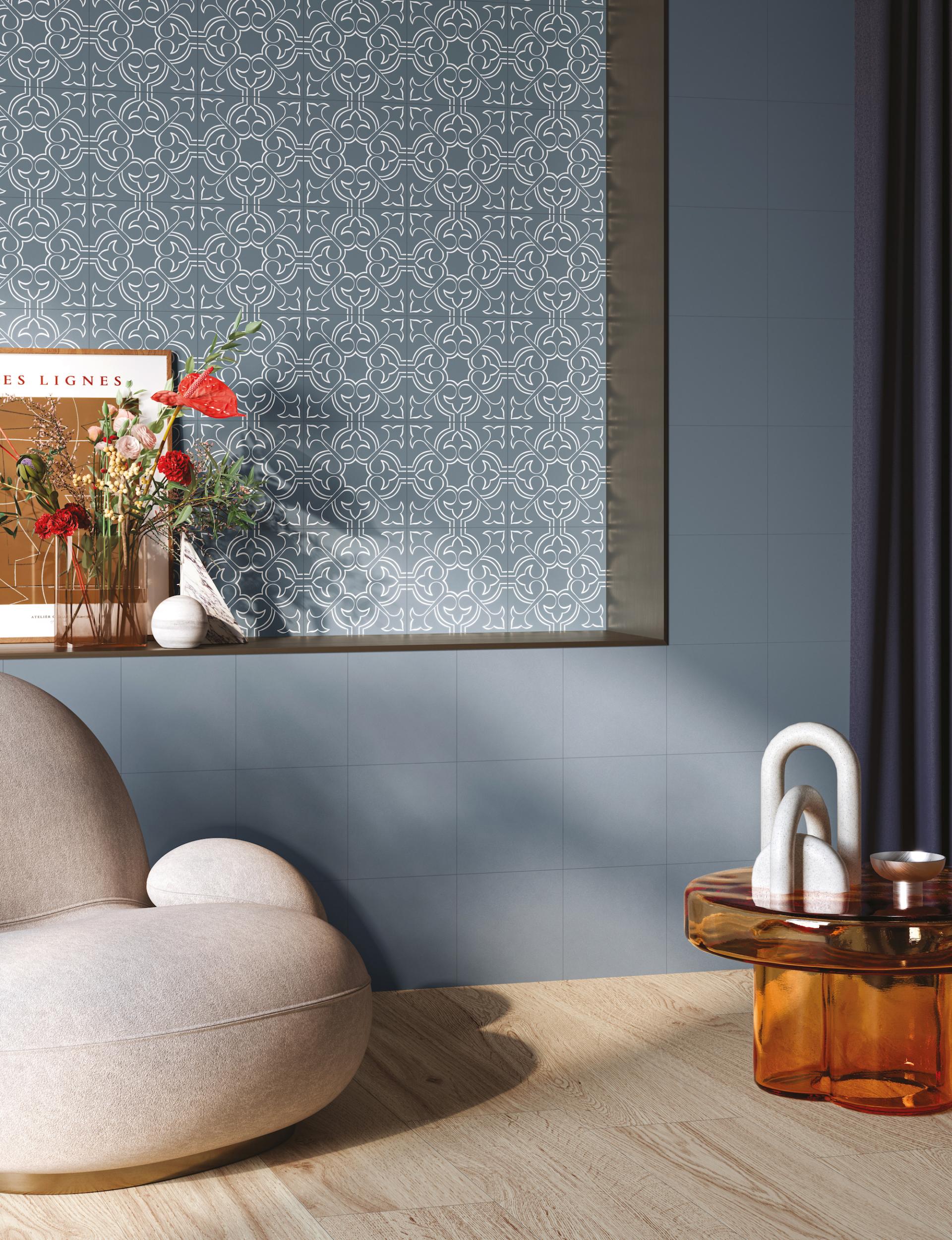 Porcelain tiles from Grestec's Silence Collection, featuring intricate patterns in a modern living space with elegant décor.