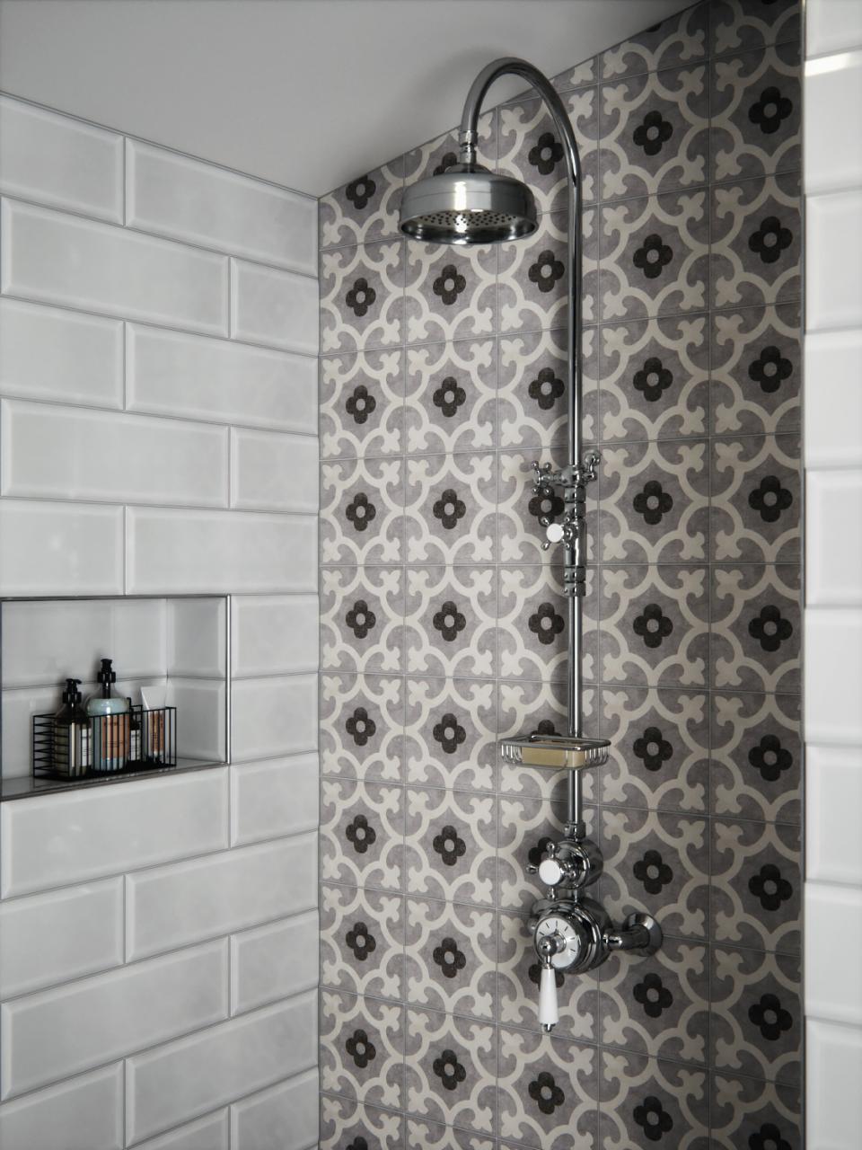 Sophisticated shower featuring V&A-inspired patterned tiles, sleek chrome fixtures, and elegant storage for toiletries.