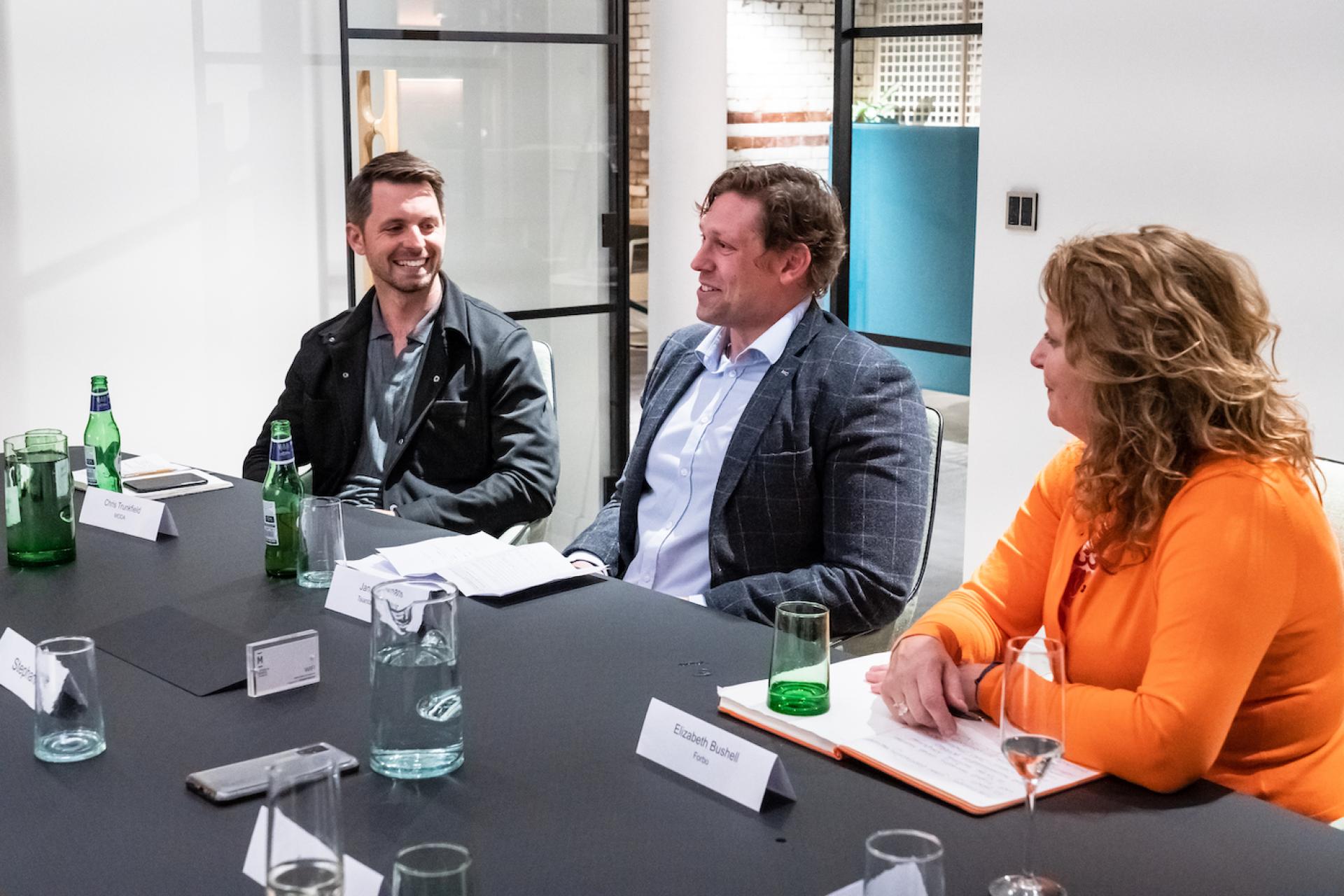 Discussion among experts at a seminar about Manchester's property market, focusing on BTR and co-living trends.