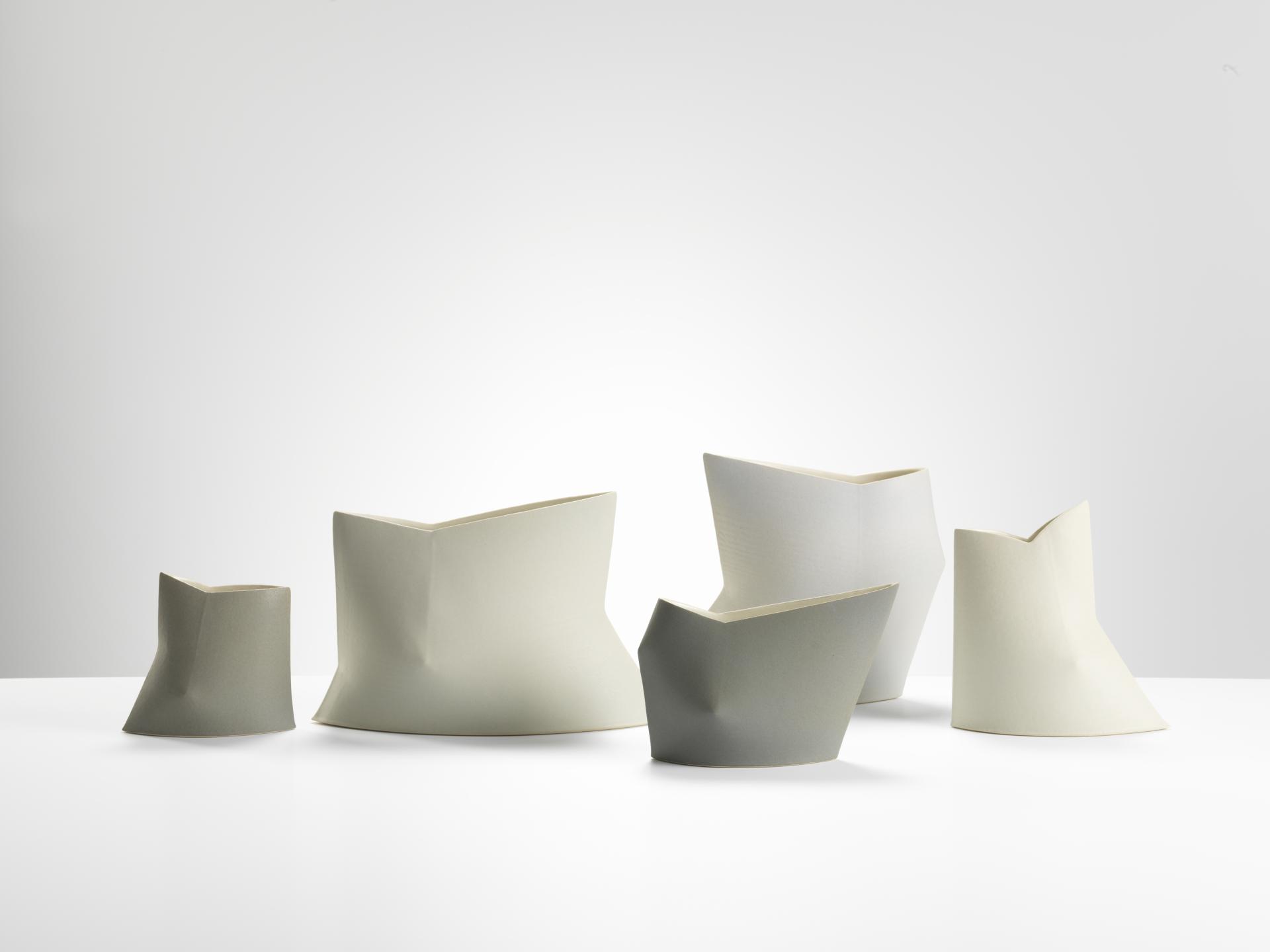Stylish sculptural ceramics displayed in various muted tones, showcasing craftsmanship at London Craft Week 2019.
