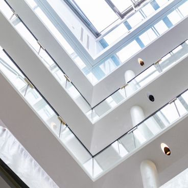Modern architectural design of The National Gallery’s One Accommodation Hub, showcasing open spaces and natural light.