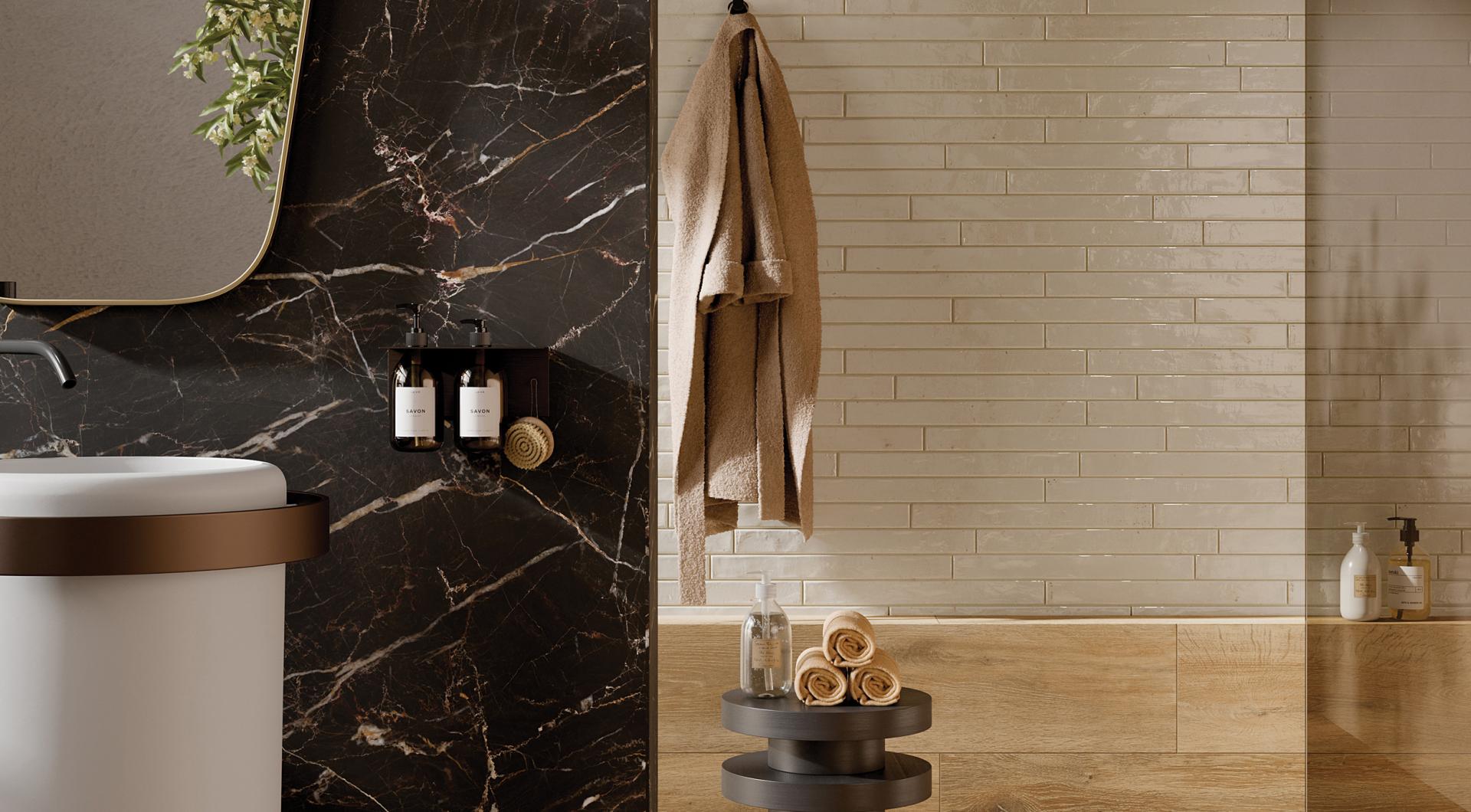 Contemporary bathroom featuring Grestec's Mastreta collection elongated tiles, dark marble accents, and elegant decor elements.
