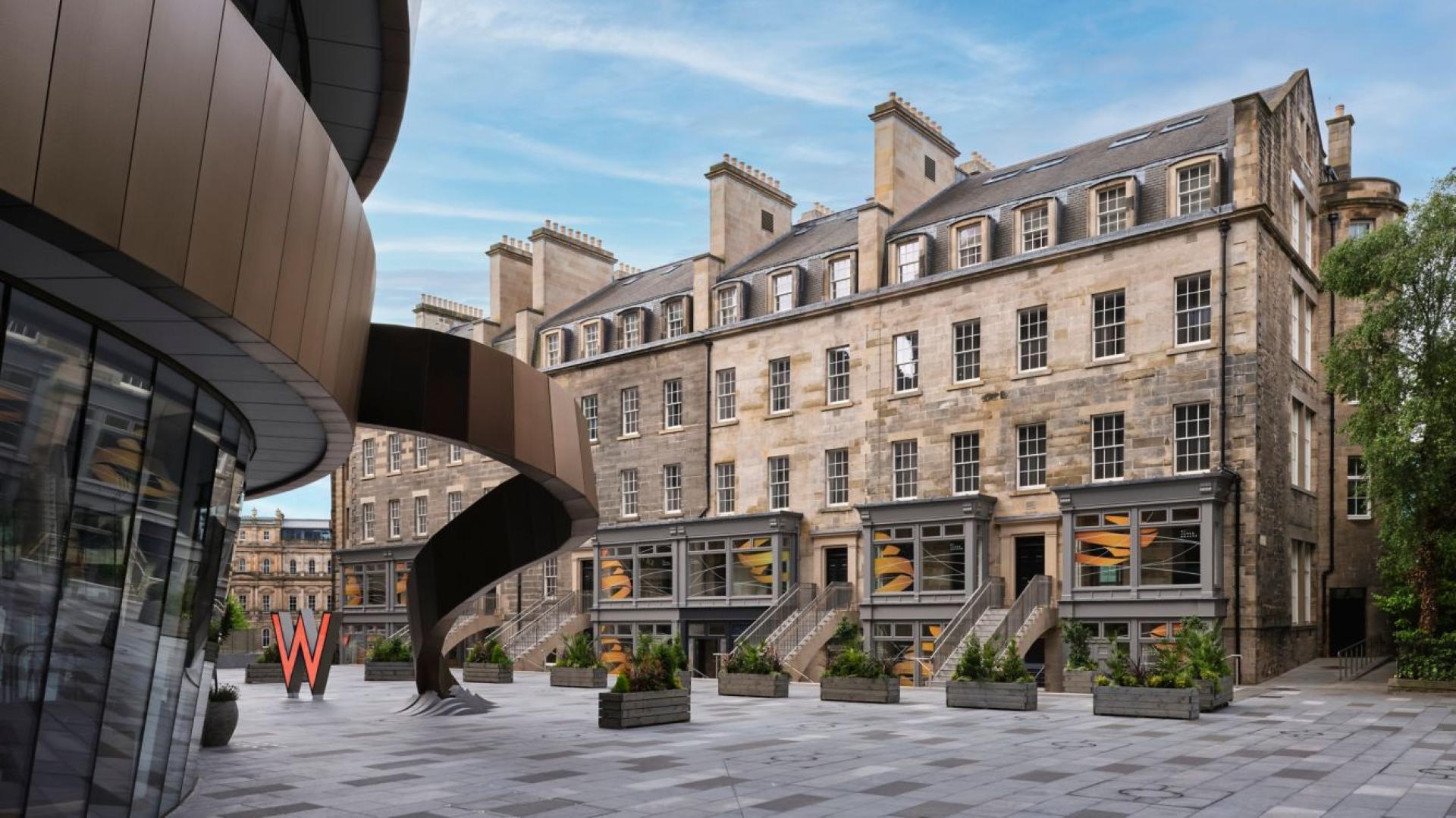 W Hotel Edinburgh's striking architecture featuring botanical elements and modern design in the vibrant St James Quarter.