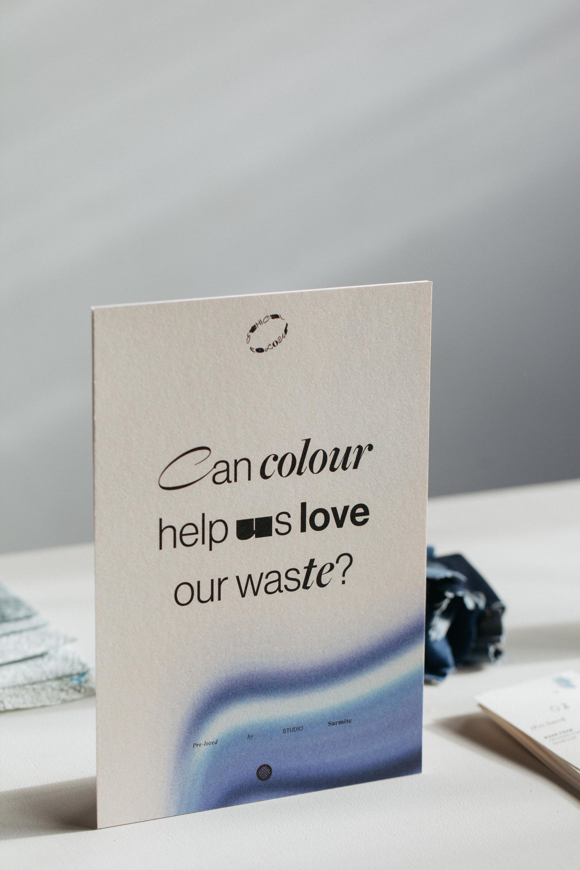 Card with a question about using color to enhance waste in sustainable design, featuring soft gradients and bold typography.