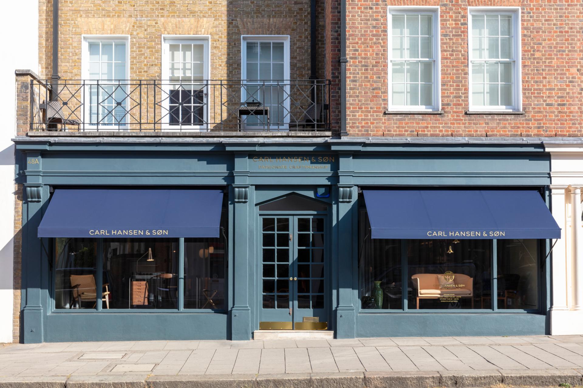 Facade of Carl Hansen & Son's London flagship store in Pimlico, featuring elegant design and distinctive branding.