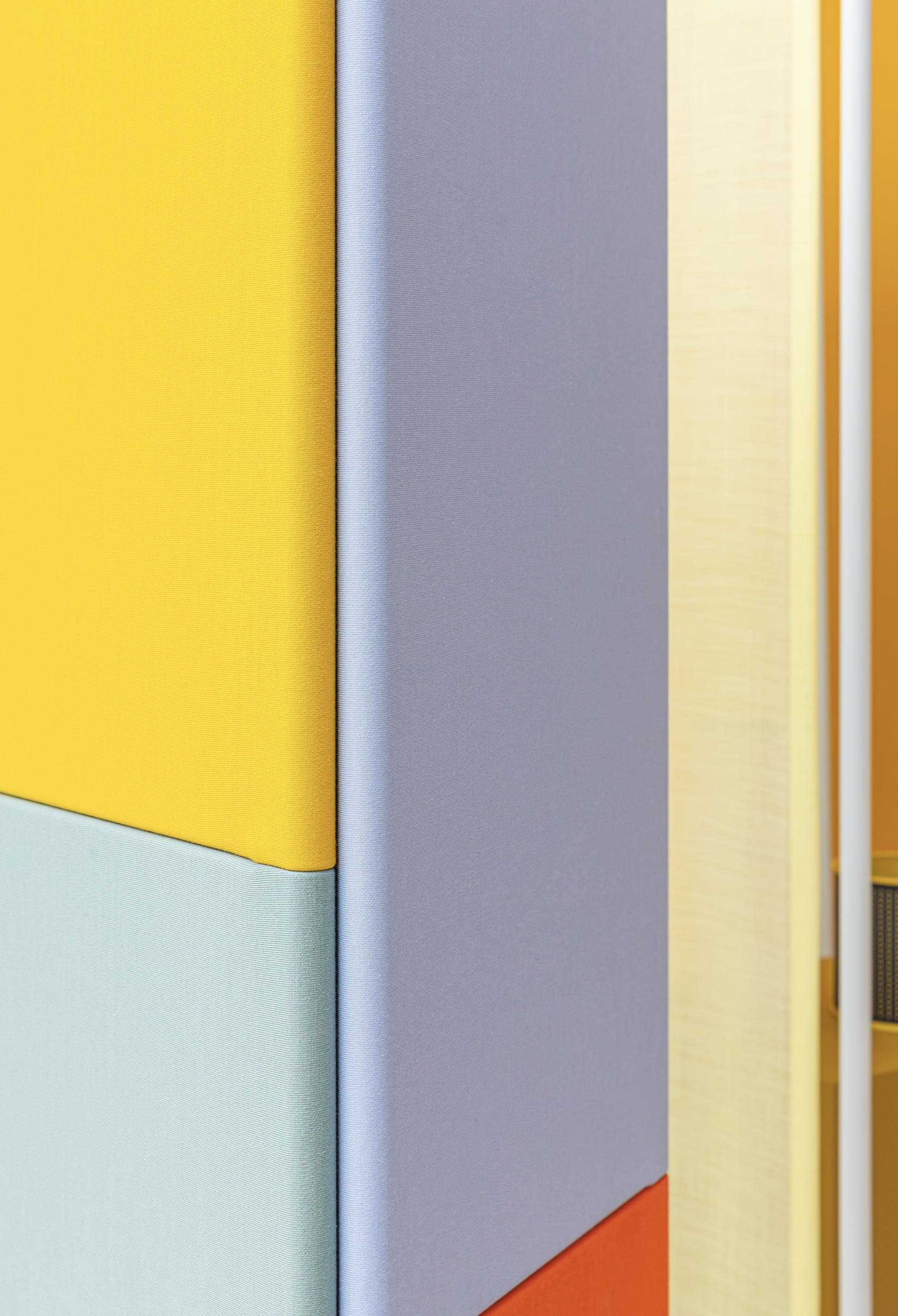 Colorful bio-based material panels showcase innovative design by Raw Color in an exploration of sustainable aesthetics.