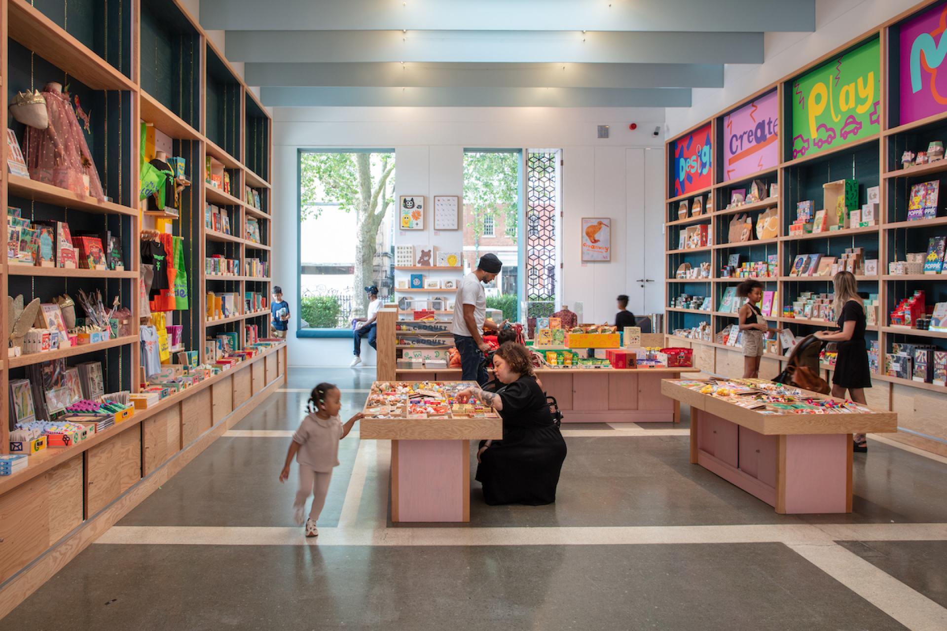 Brightly colored play area in Young V&A, featuring children exploring creative toys and activities in a welcoming environment.
