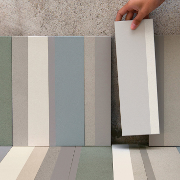 Piano tile collection showcasing various textured tiles in muted colors, designed for contemporary interiors by Mutina.