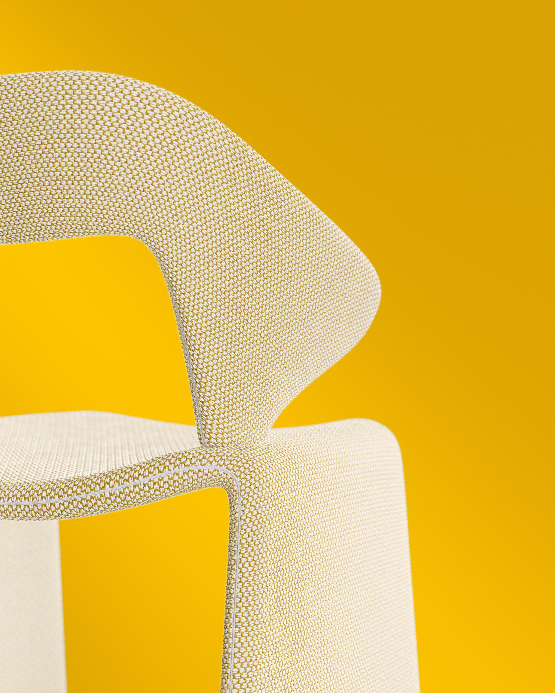 Modern chair design emphasizing vibrant colors and comfort, showcasing TextileMania's innovative approach to furniture manufacturing.