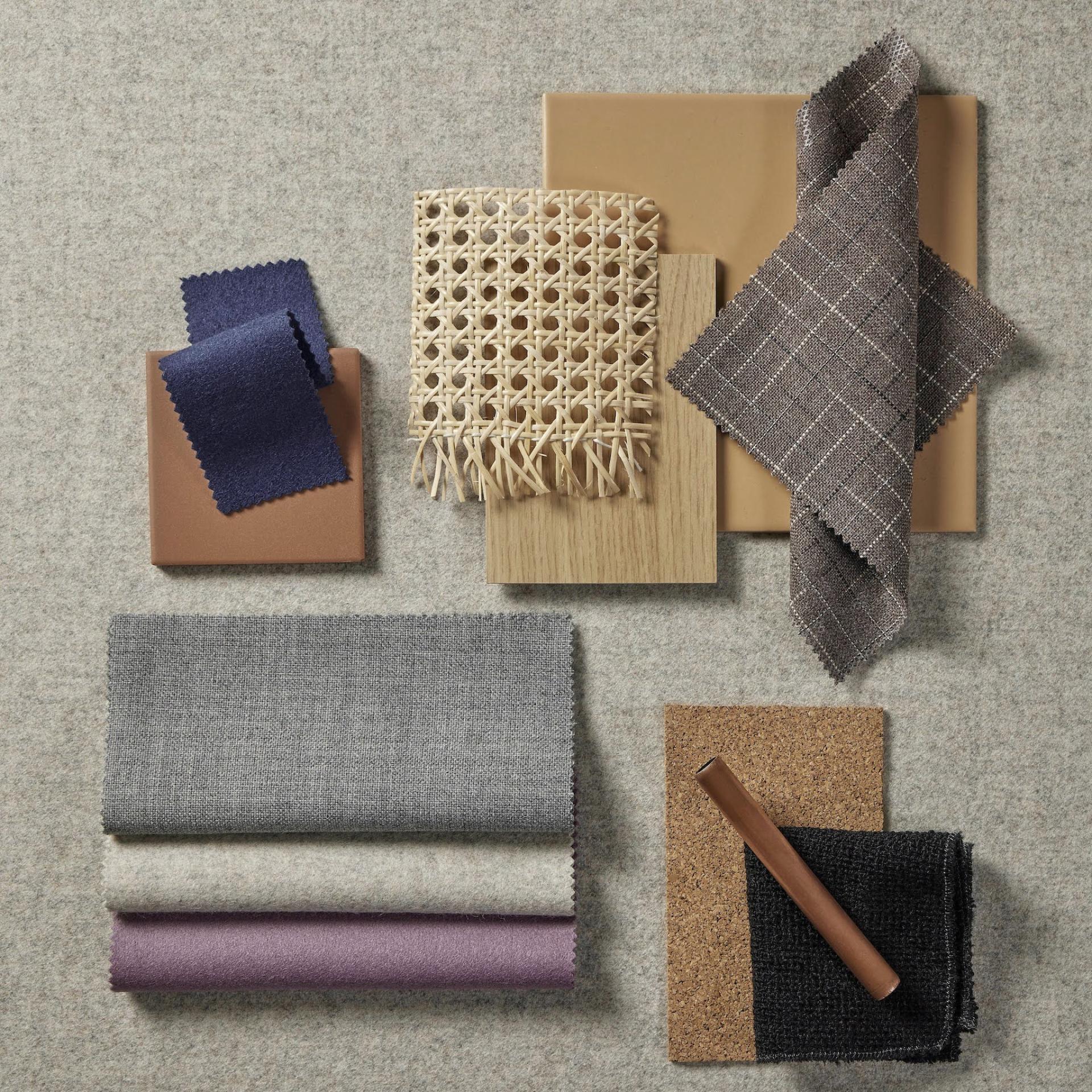 A collection of modern fabric swatches and materials showcasing textures and colors for contemporary interior design inspiration.