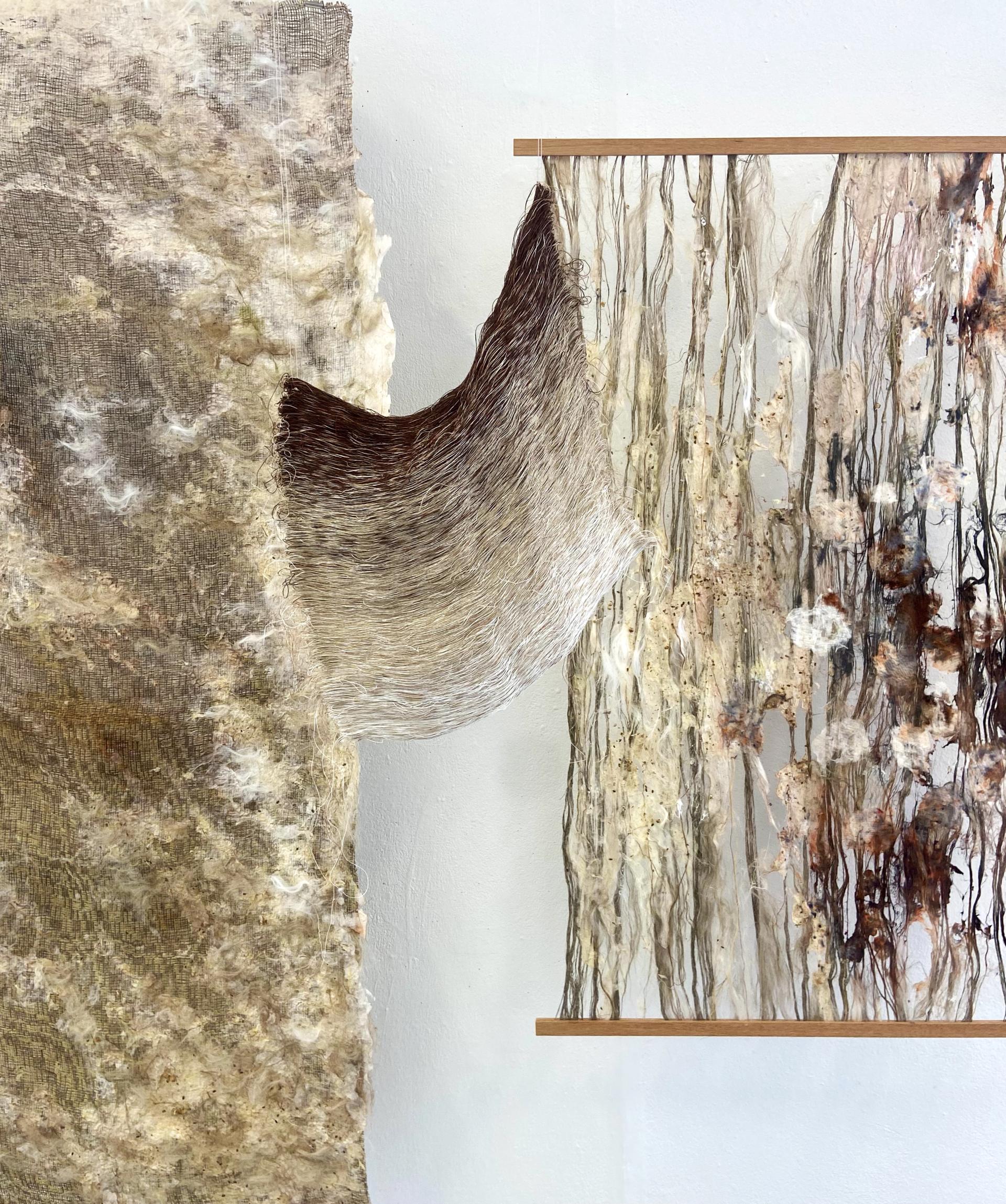 Textile art installation showcasing innovative materials and techniques, featured at New Designers 2024 event.