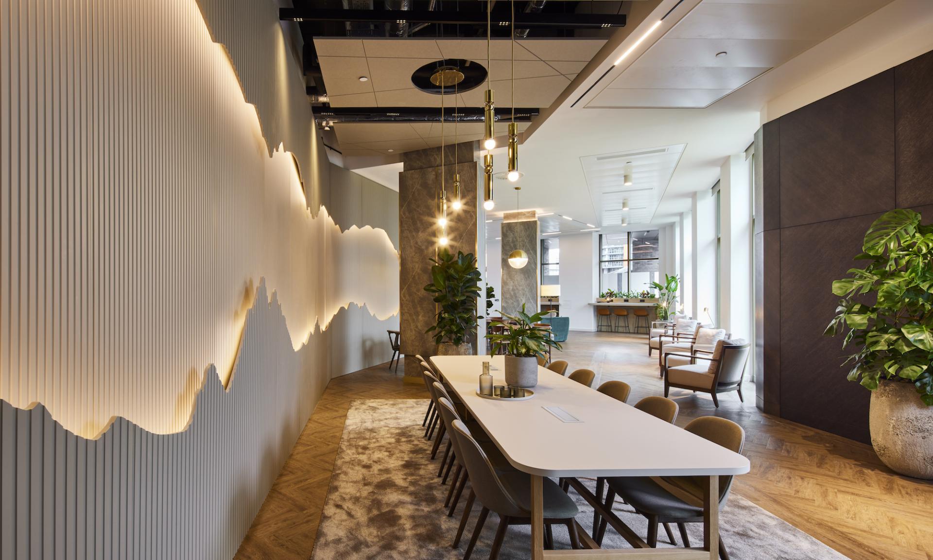 Modern residential amenity space designed by SpaceInvader, featuring elegant furnishings and a welcoming atmosphere overlooking the River Irwell.