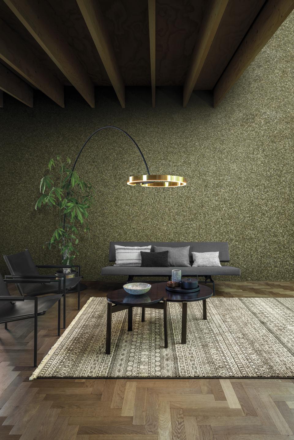 Stylish living room featuring Omexo’s sustainable wallcovering, modern furniture, and a decorative indoor plant.