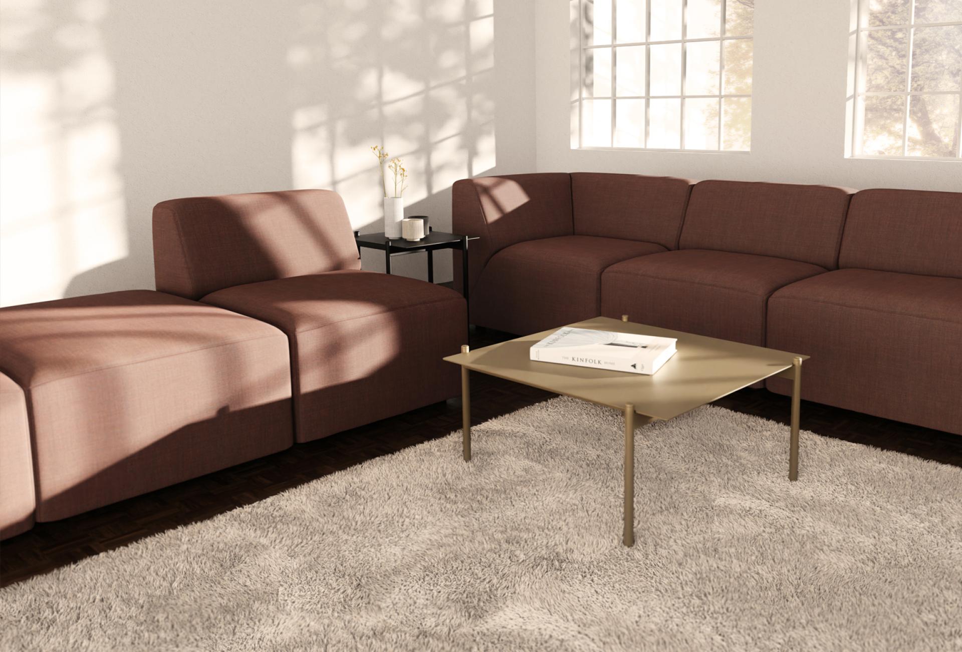 Modern living room featuring sustainable Sedir furniture, with brown upholstery, stylish coffee table, and natural light enhancing the space.