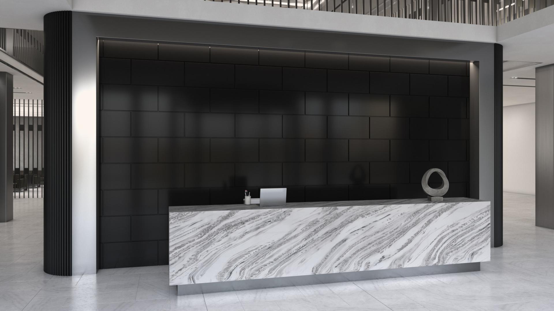 Modern reception area featuring Corian® countertops with a marble design, complemented by a sleek black wall.