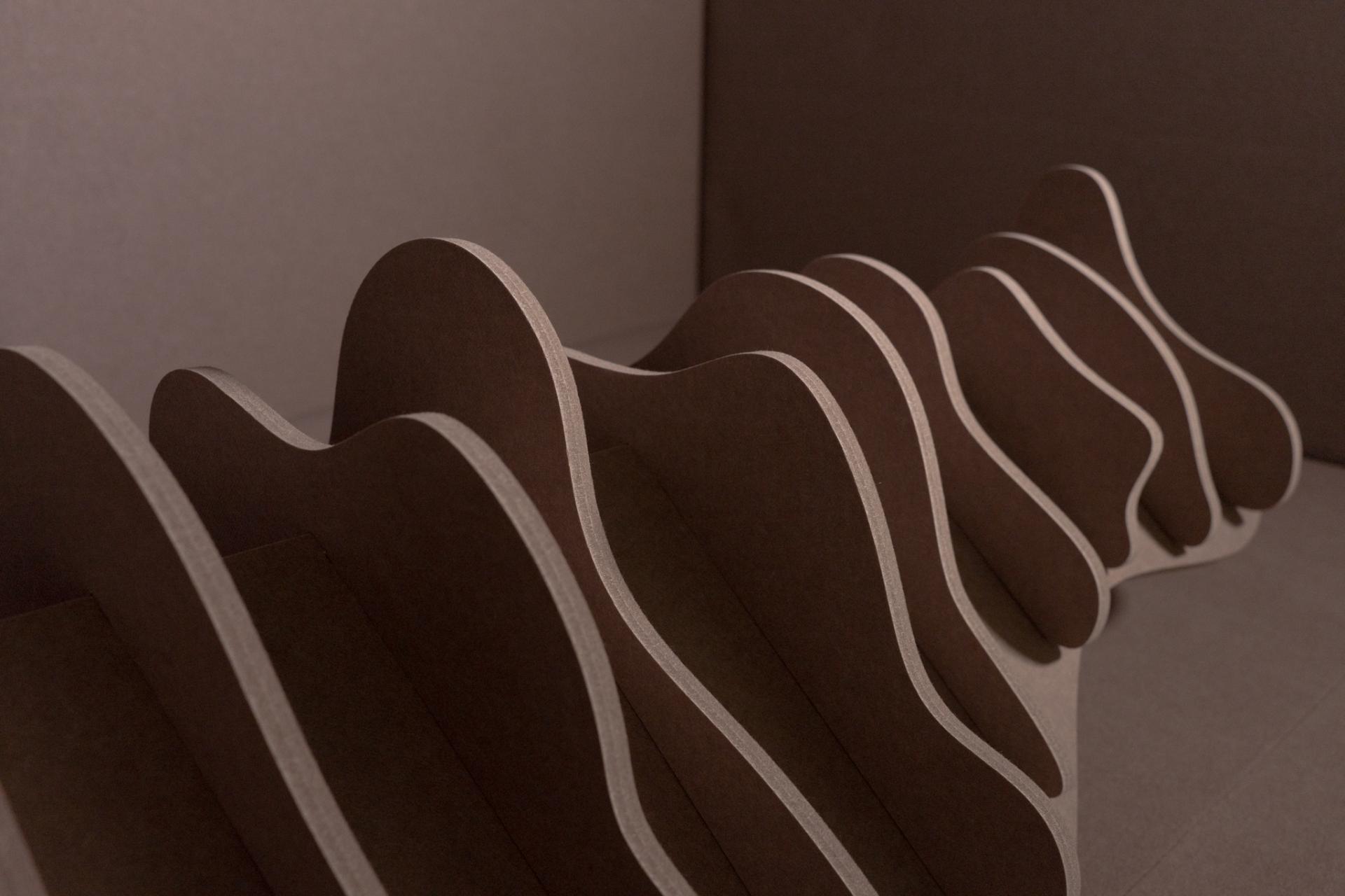 Curved acoustic panel design showcasing Autex Acoustics' new color palette inspired by natural landscapes.