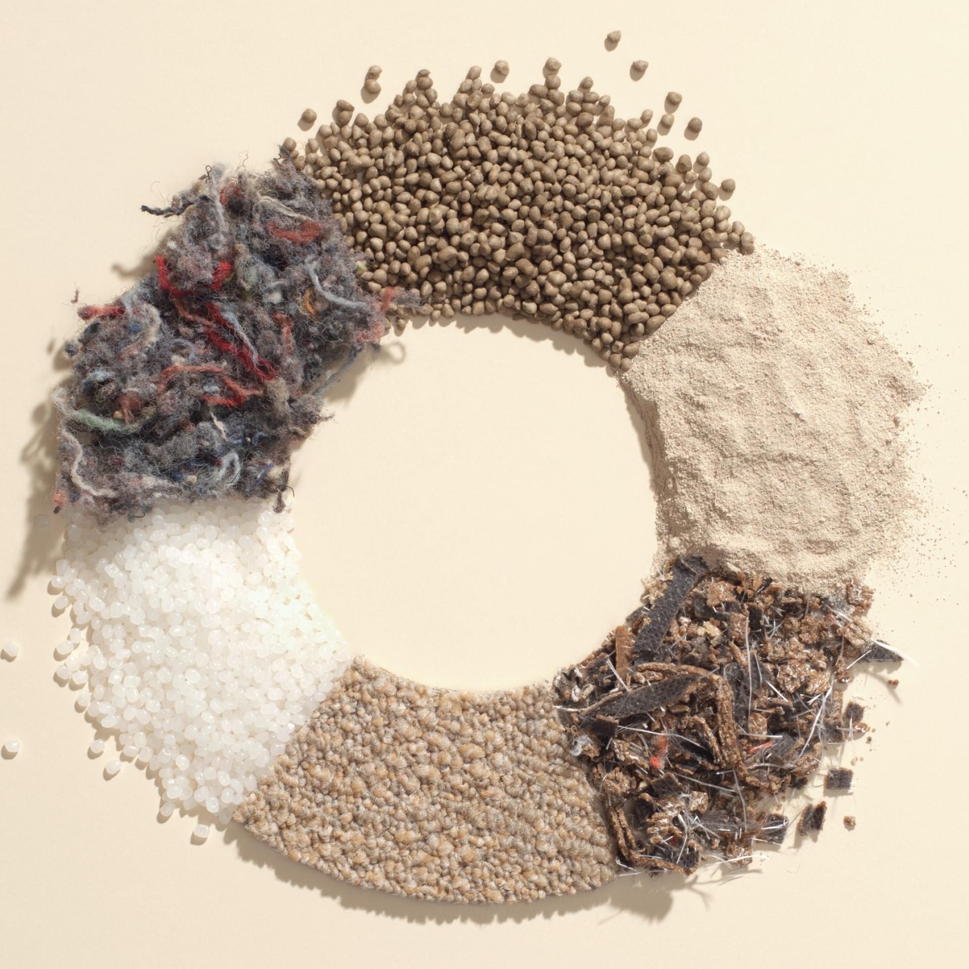 A circular arrangement of various sustainable materials, showcasing innovative options for workplace design at Workspace Design Show 2023.