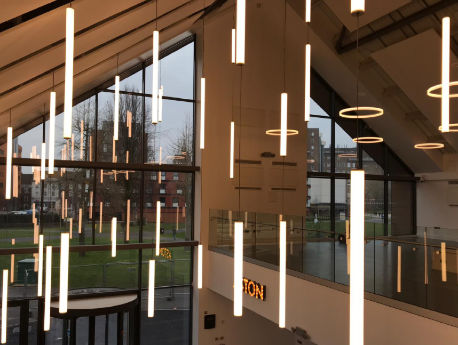 Modern interior design featuring pendant lights and large windows in the upcoming Material Source Studio in Manchester.