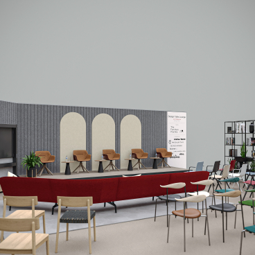 Modern workspace design featuring a stylish lounge area with seating, a presentation screen, and greenery for the Workspace Design Show.