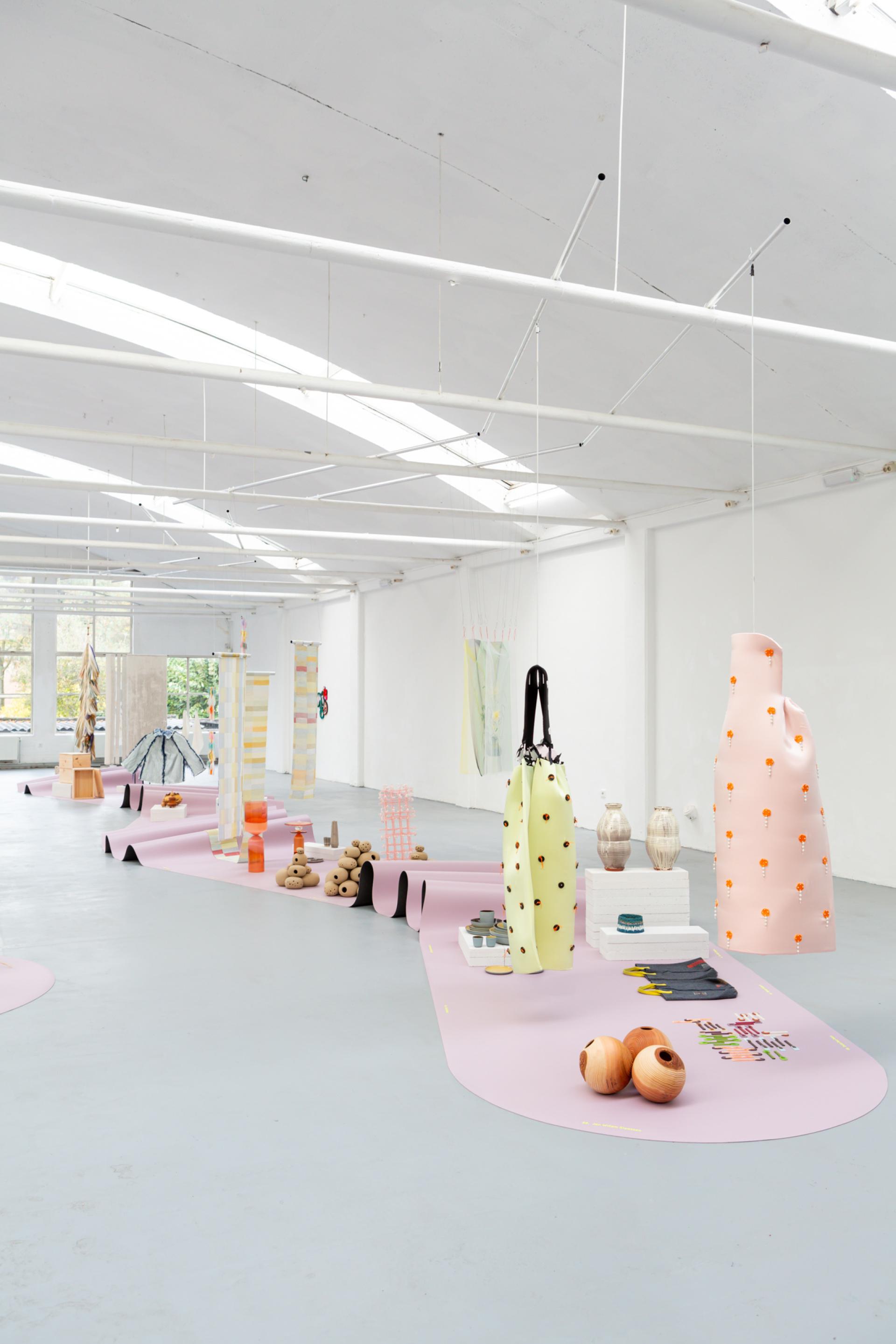 Craft in colour: Forbo’s Furniture Linoleum in Soft Lilac frames HOW&WOW at Dutch Design Week 2025.