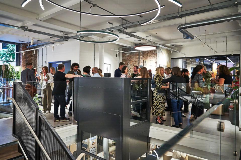 Guests mingling at the 42 Gathering event, celebrating the podcast 