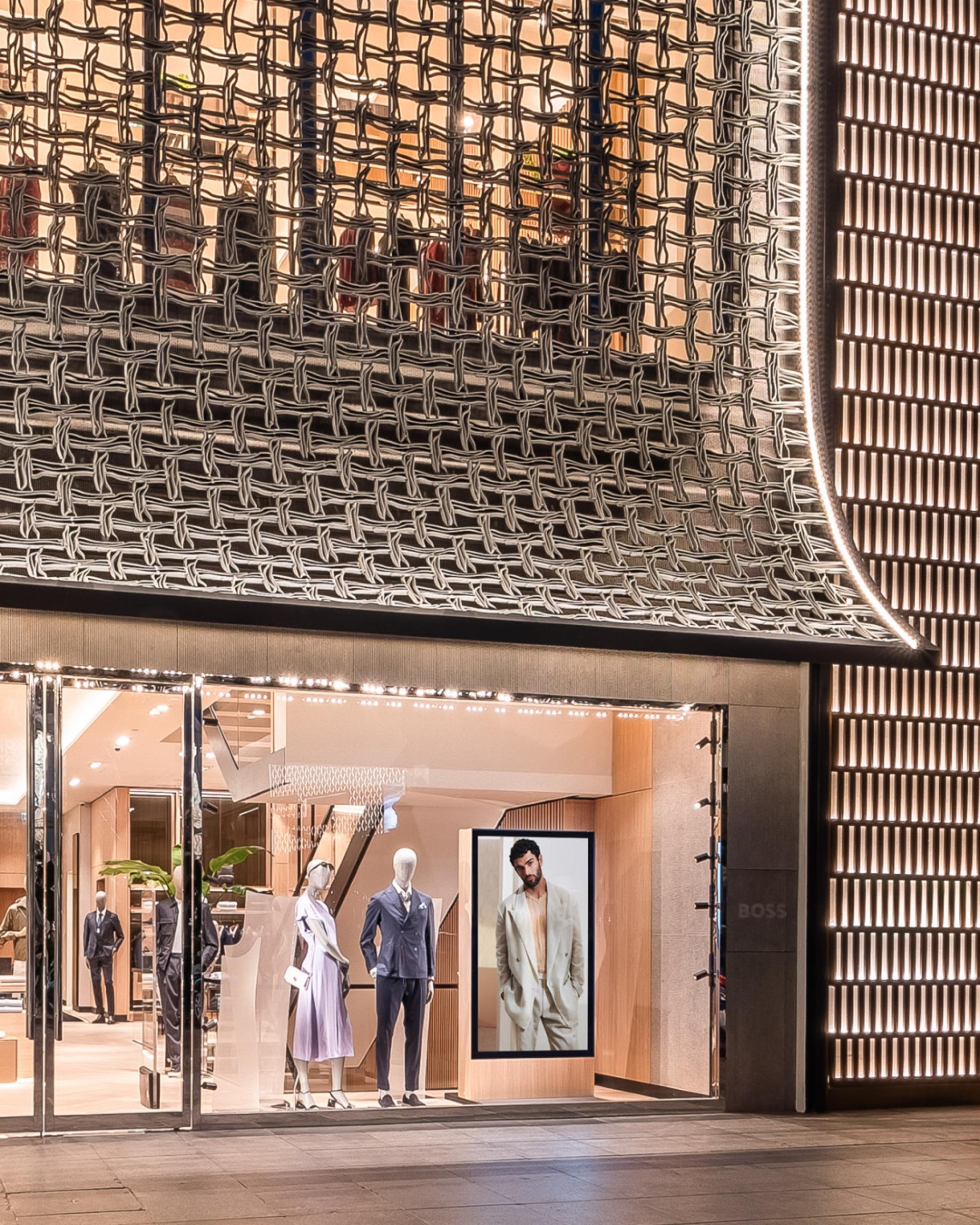 BOSS store exterior featuring a unique interlocking 3D printed façade made from recycled materials at İstinye Park, Istanbul.