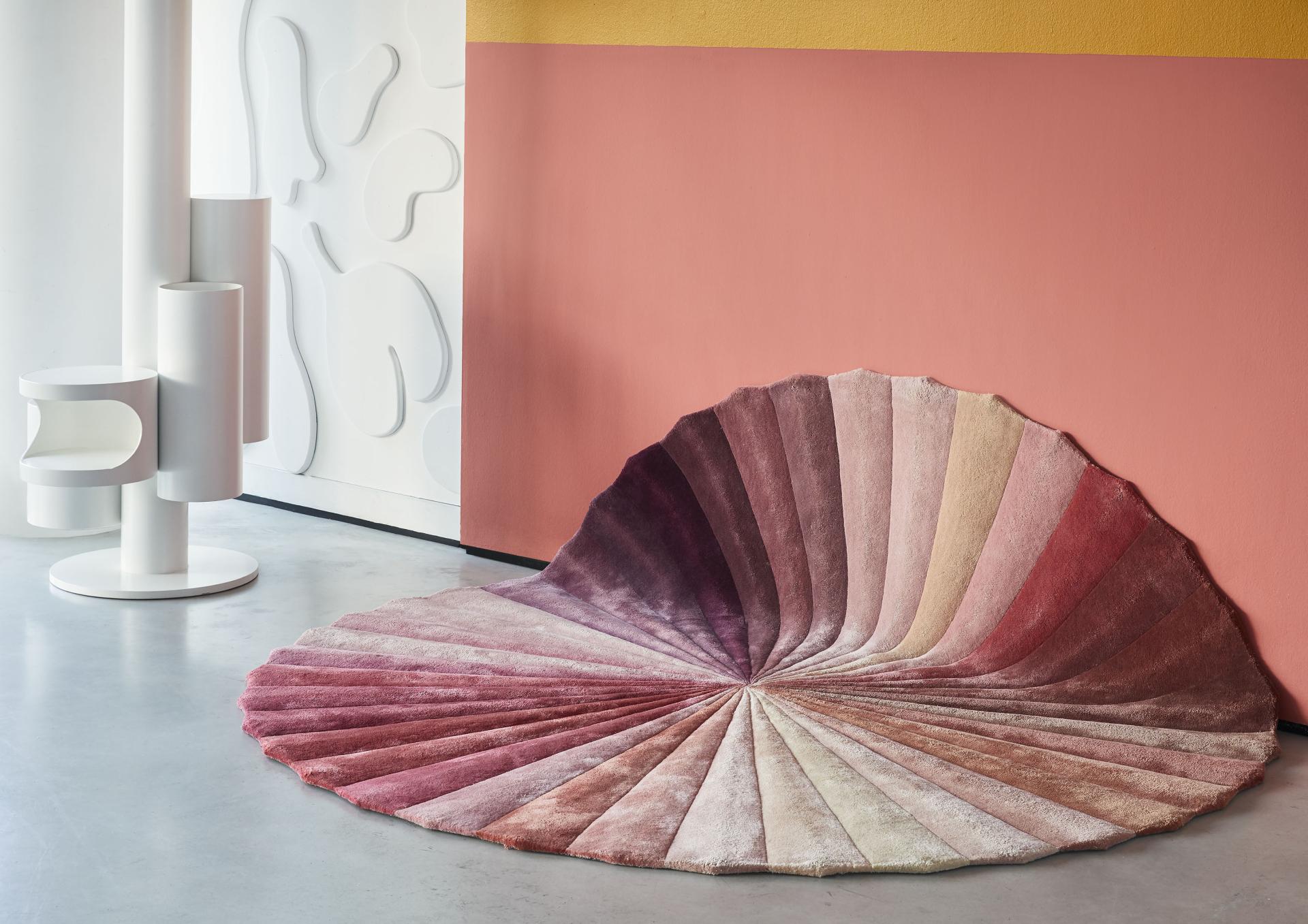 Colourful layered rug inspired by shell design, showcasing Kitty Joseph and FLOOR_STORY's artistic collaboration in a modern interior setting.
