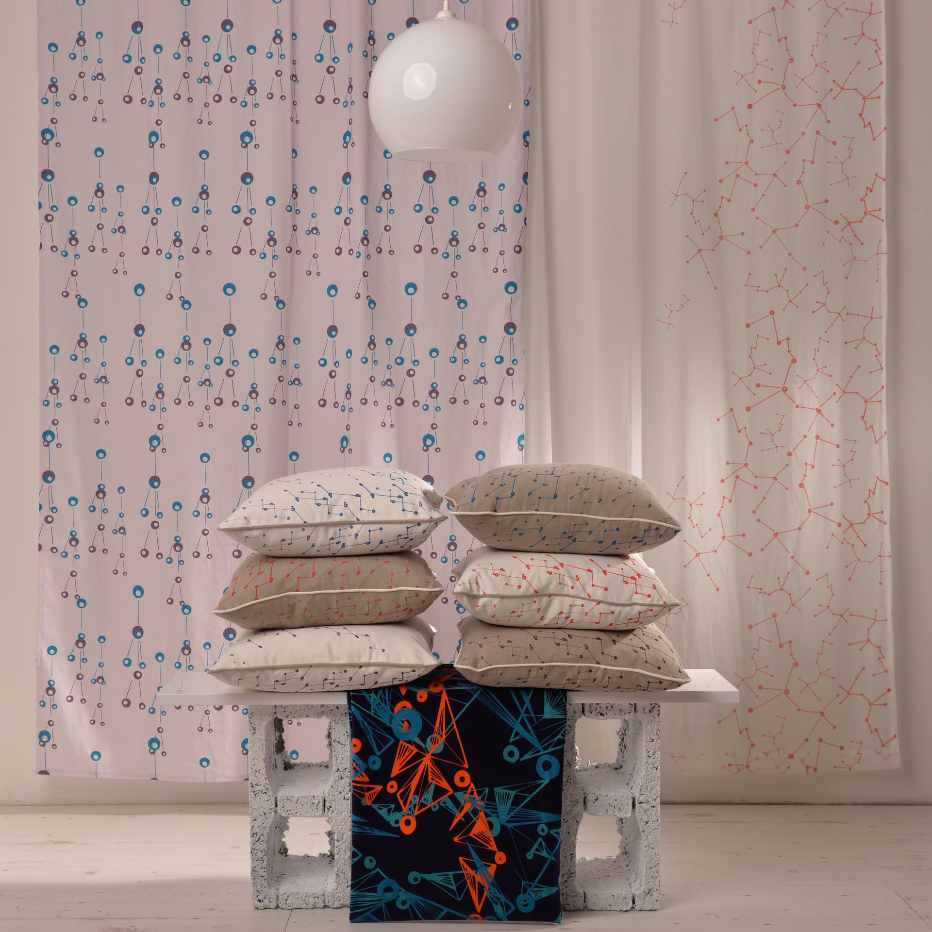 Colorful bespoke pillows and vibrant textile designs from Moody Monday, showcasing creativity and joy in Edinburgh interiors.