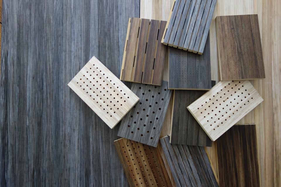 FIBandCO's banana plant trunk products displayed, showcasing various textures and colors of sustainable wood materials.