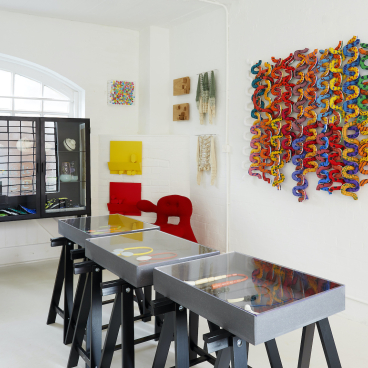 Colorful contemporary art pieces and unique design displays in the House on Mars gallery during Collect 2021 art fair.