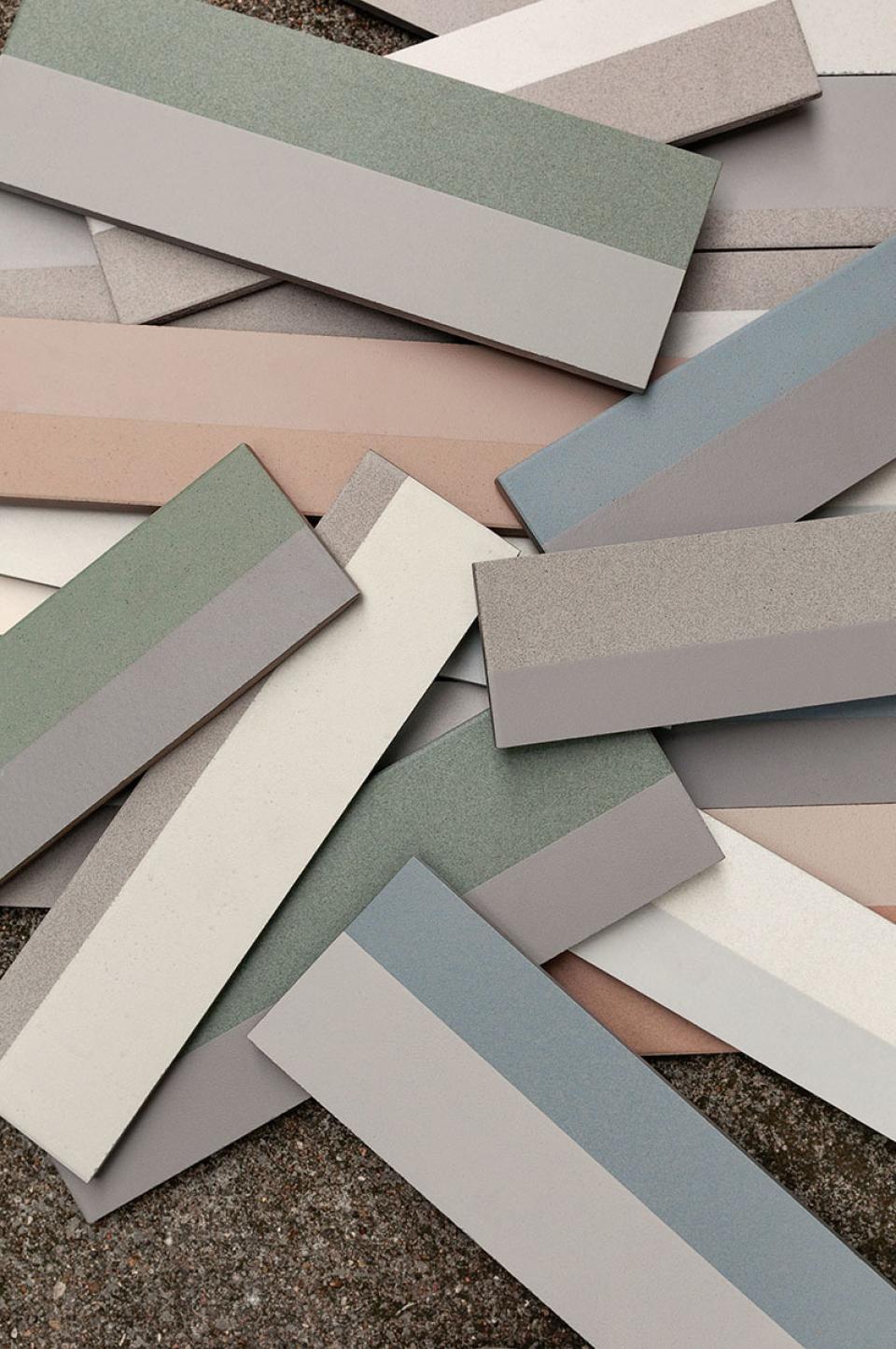 Colorful ceramic tiles in various muted shades, part of Domus's Piano collection for Clerkenwell Design Week 2018.