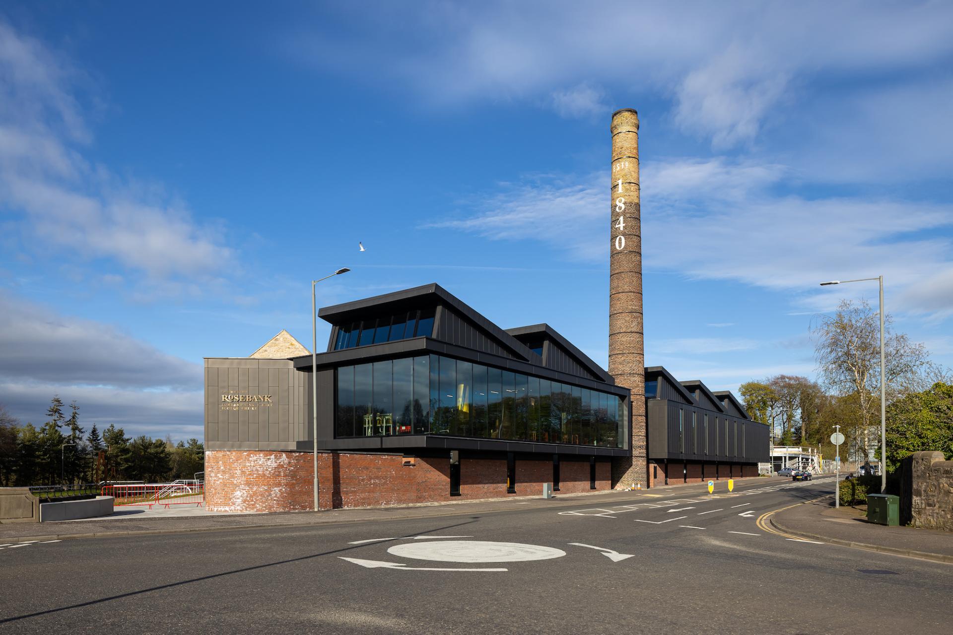 Rosebank Distillery's modern renovation showcases a striking blend of historic architecture and contemporary design elements.