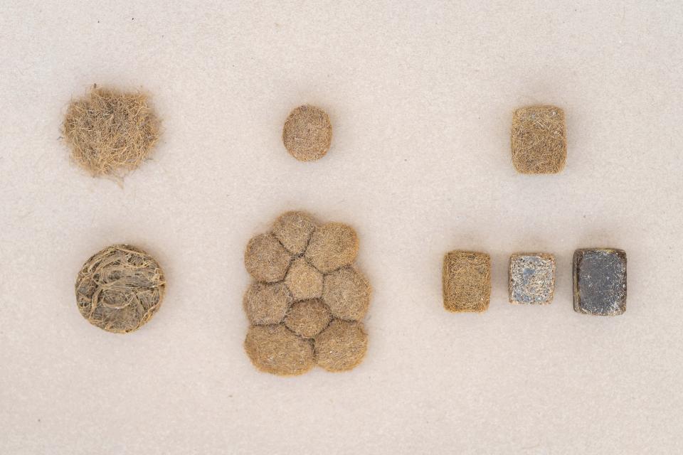 Natural Posidonia seagrass materials arranged on a neutral background, showcasing sustainable design inspired by marine ecosystems.