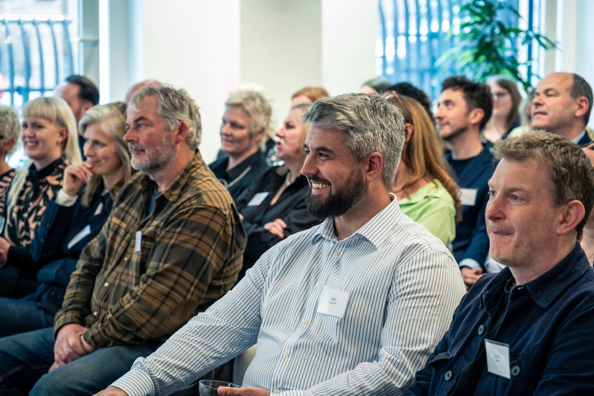 Audience engaged during Glasgow Property Outlook event, highlighting positive sentiment in the local real estate market.