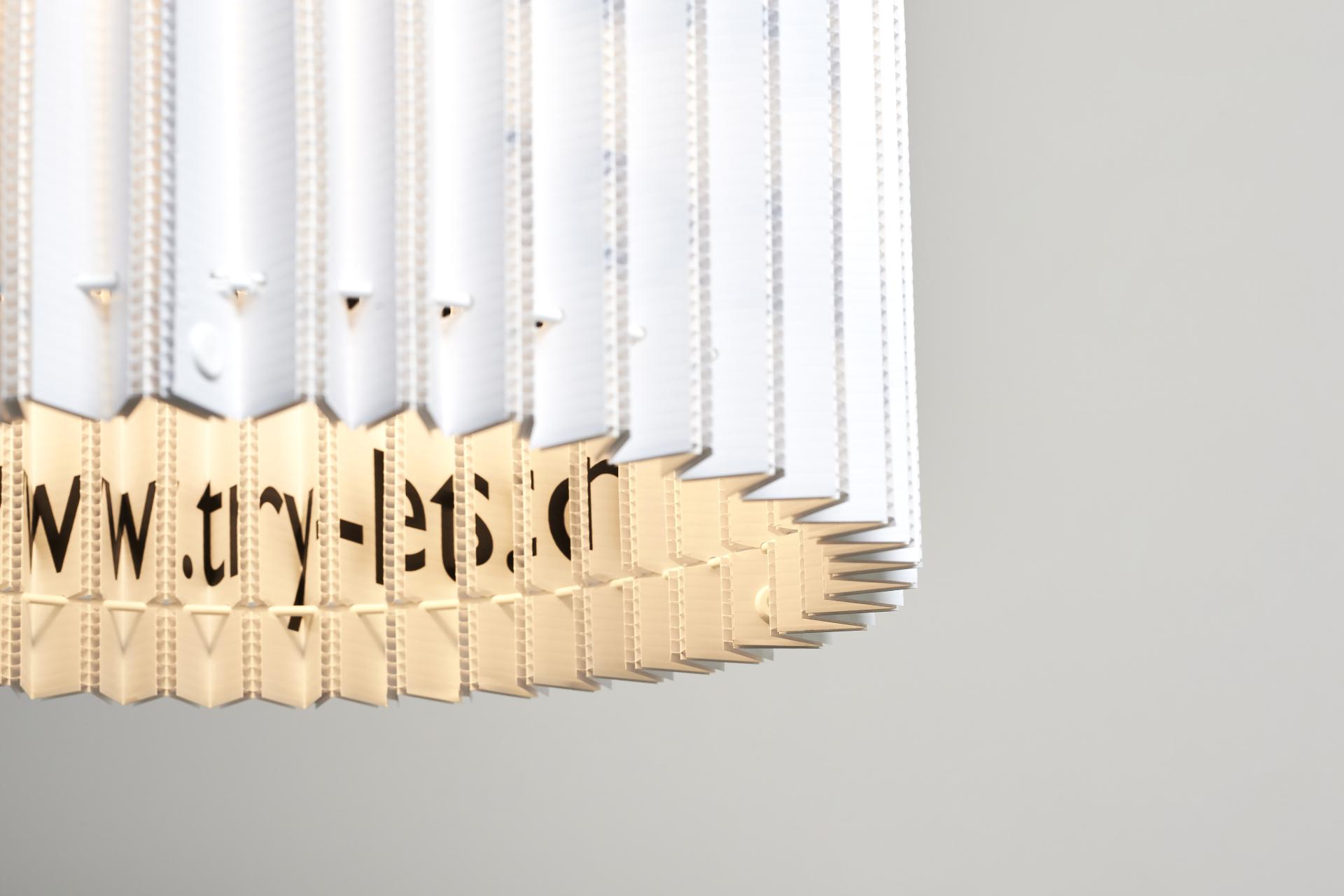 Sustainable sculptural lampshade by Tabitha Bargh, showcasing innovative use of everyday materials and unique design elements.