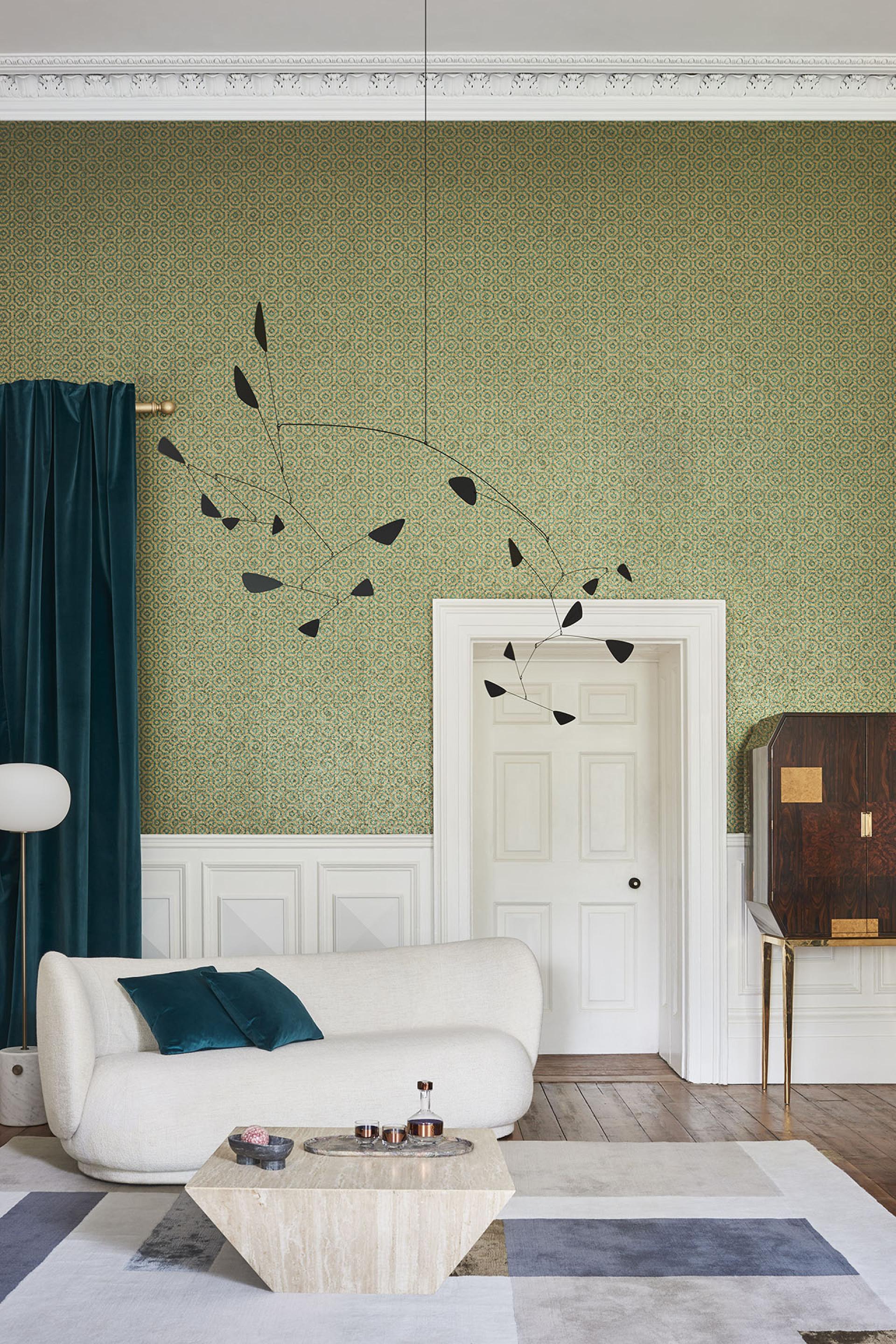 Stylish living room featuring modern décor, rich wallpaper, and elegant furnishings, showcasing Cole & Son's Great Masters collection.