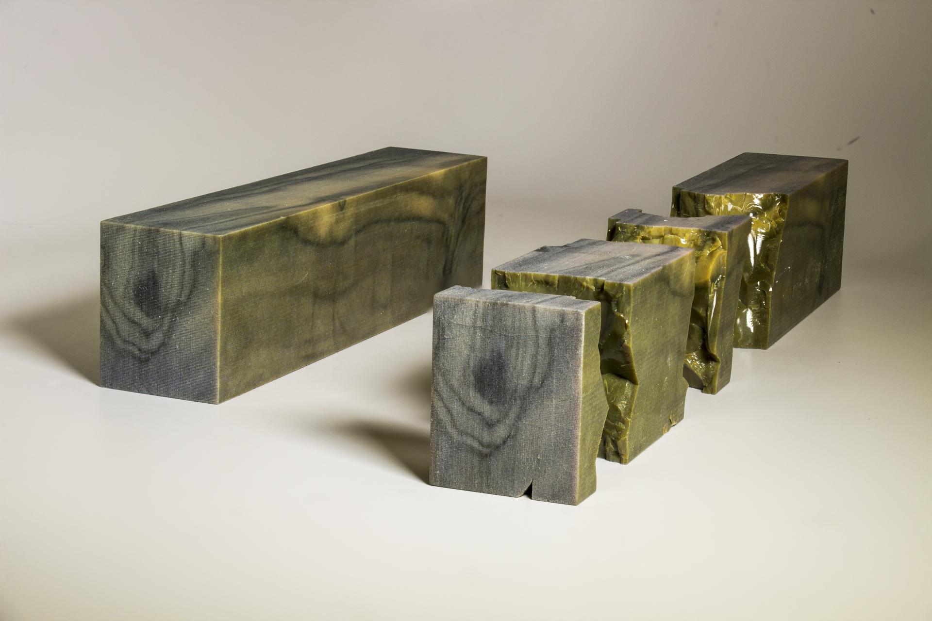 Sustainable alternative to wood displayed as unique, textured blocks in various shapes and sizes.