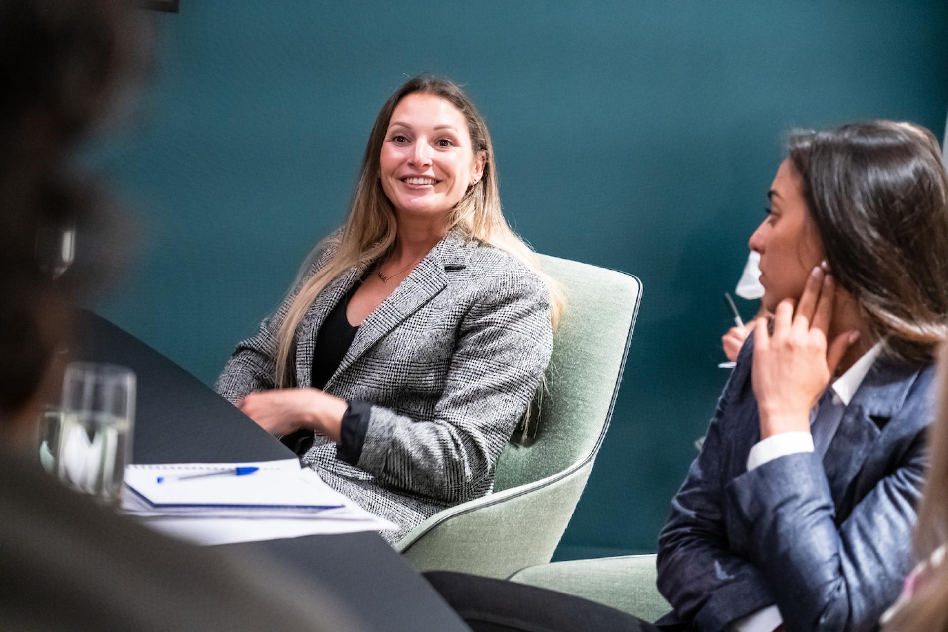 Participants engaged in discussion at a seminar on Manchester's property outlook and co-living trends.