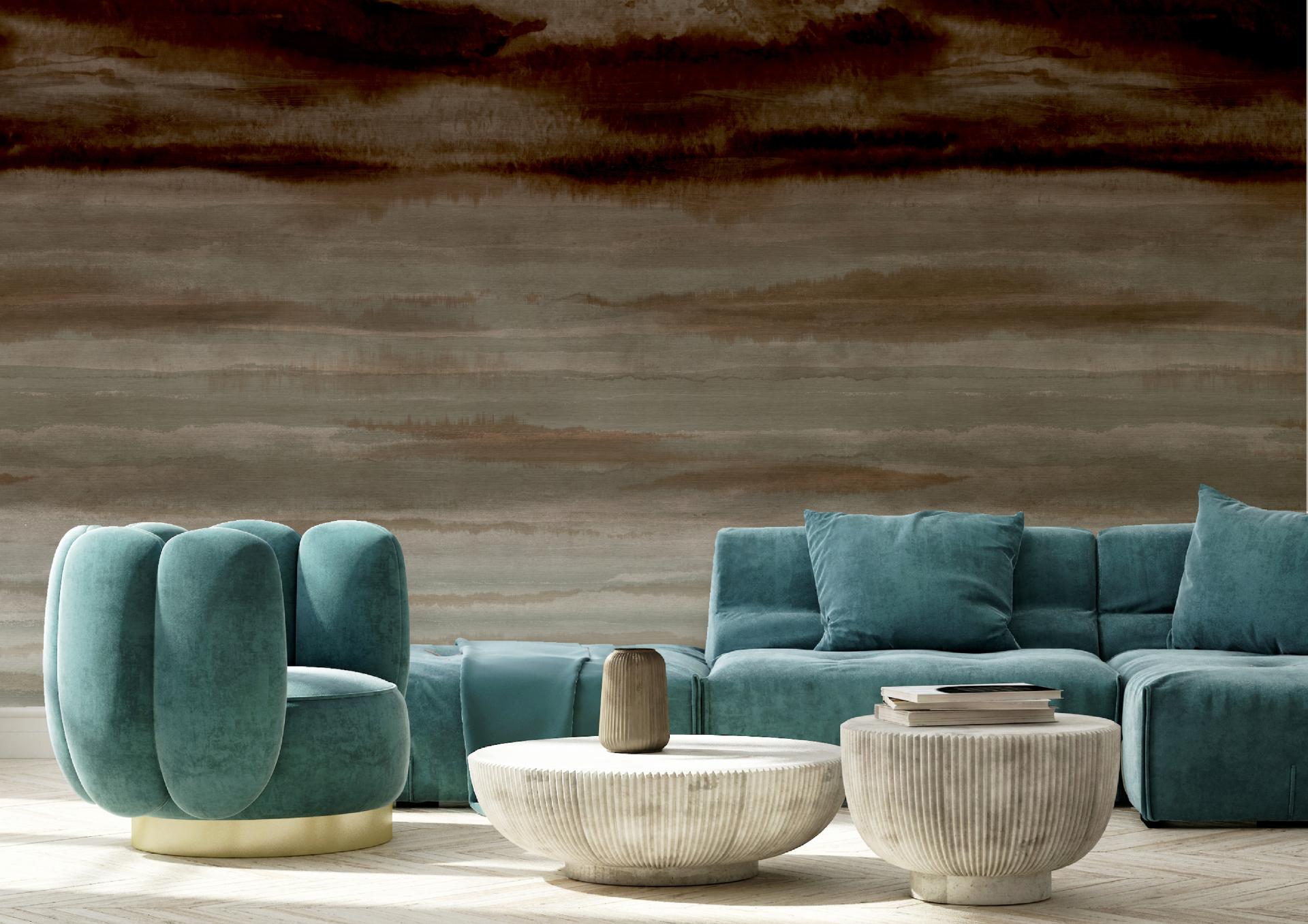 Elegant living space featuring Muraspec's Dreamscape ombre wallcovering, luxurious teal furniture, and stylish coffee tables.
