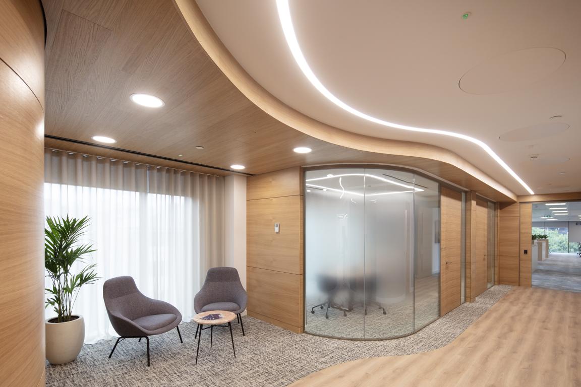 Radii Planet combines timber and curved glazing for meeting rooms and offices at Evelyn Partners Leeds.
