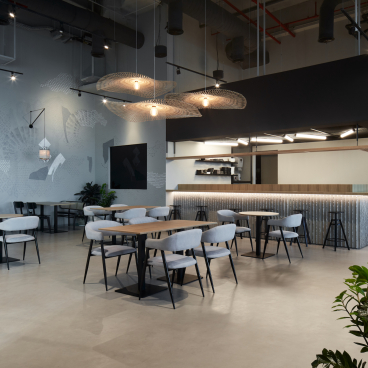 Elegant interior of Origami restaurant in Dubai featuring bespoke designs, modern furnishings, and a welcoming atmosphere.