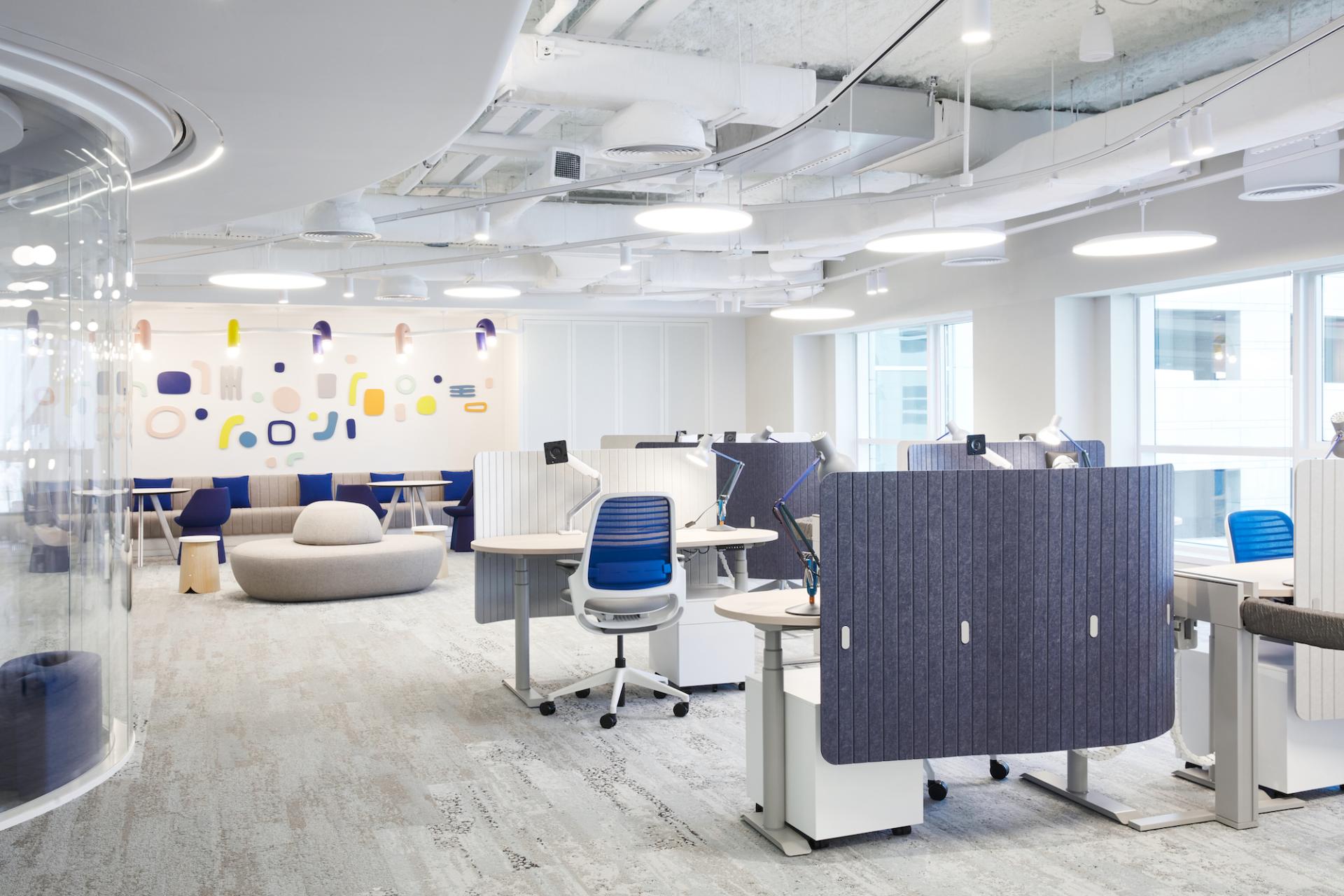 Bright, modern office space designed by Roar Studio for Abu Dhabi's Early Childhood Authority featuring collaborative workstations and playful decor.