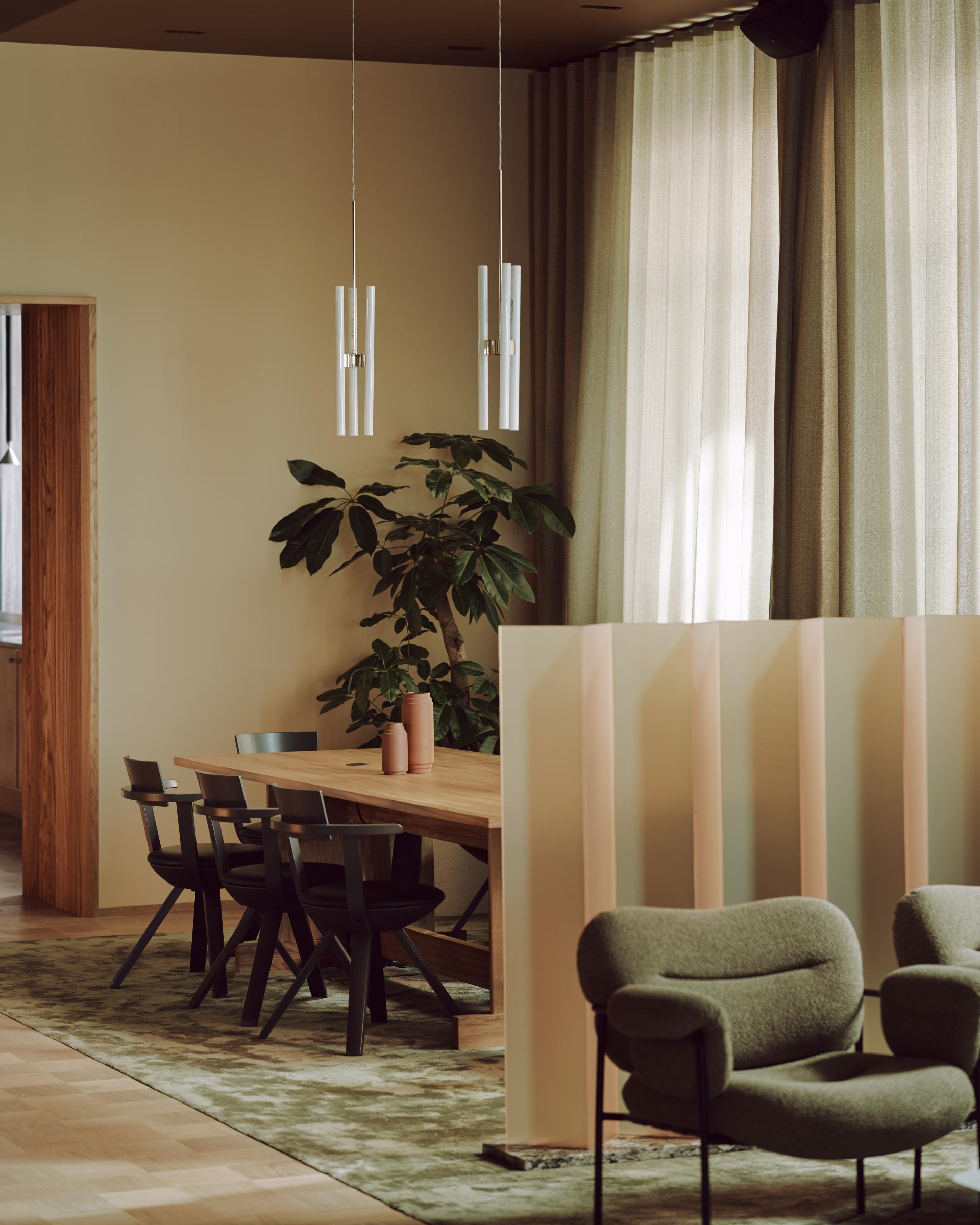 Stylish office interior at Summit House featuring a wooden table, contemporary chairs, and soft lighting for a serene workspace.