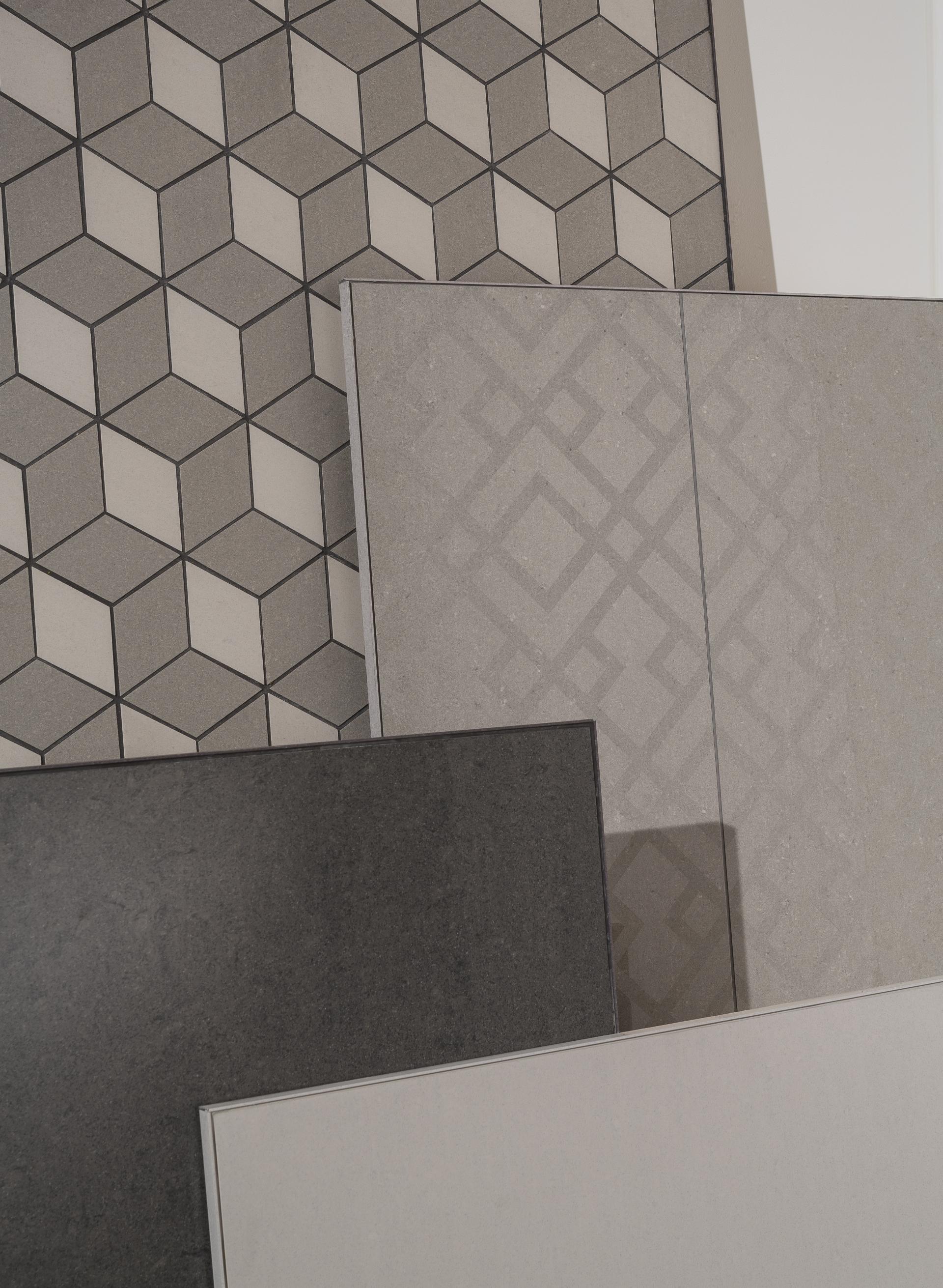 Neutral-toned tiles showcasing geometric patterns from the Regal Collection, highlighting elegant design and versatility for modern interiors.