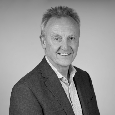 Steve McGuirk, former GM chief fire officer, discusses updates to the Building Safety Act in a professional portrait.