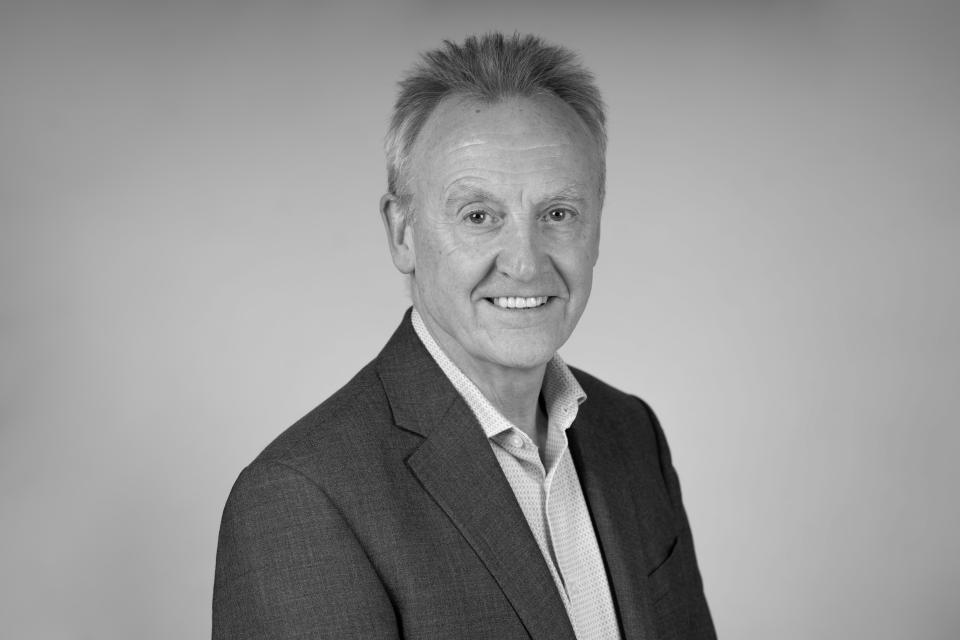 Steve McGuirk, former GM chief fire officer, discusses updates to the Building Safety Act in a professional portrait.